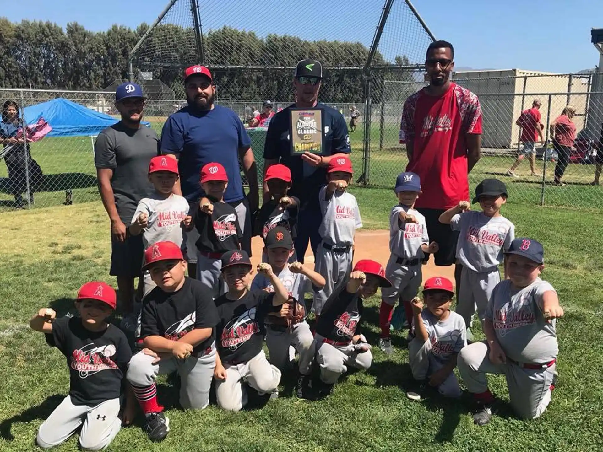 a group of baseball players posing for a photo