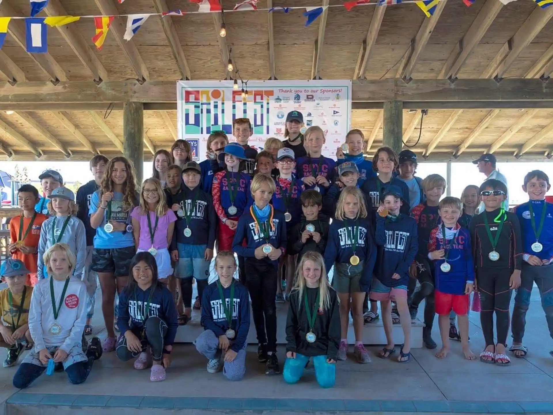 a group of children posing for a photo