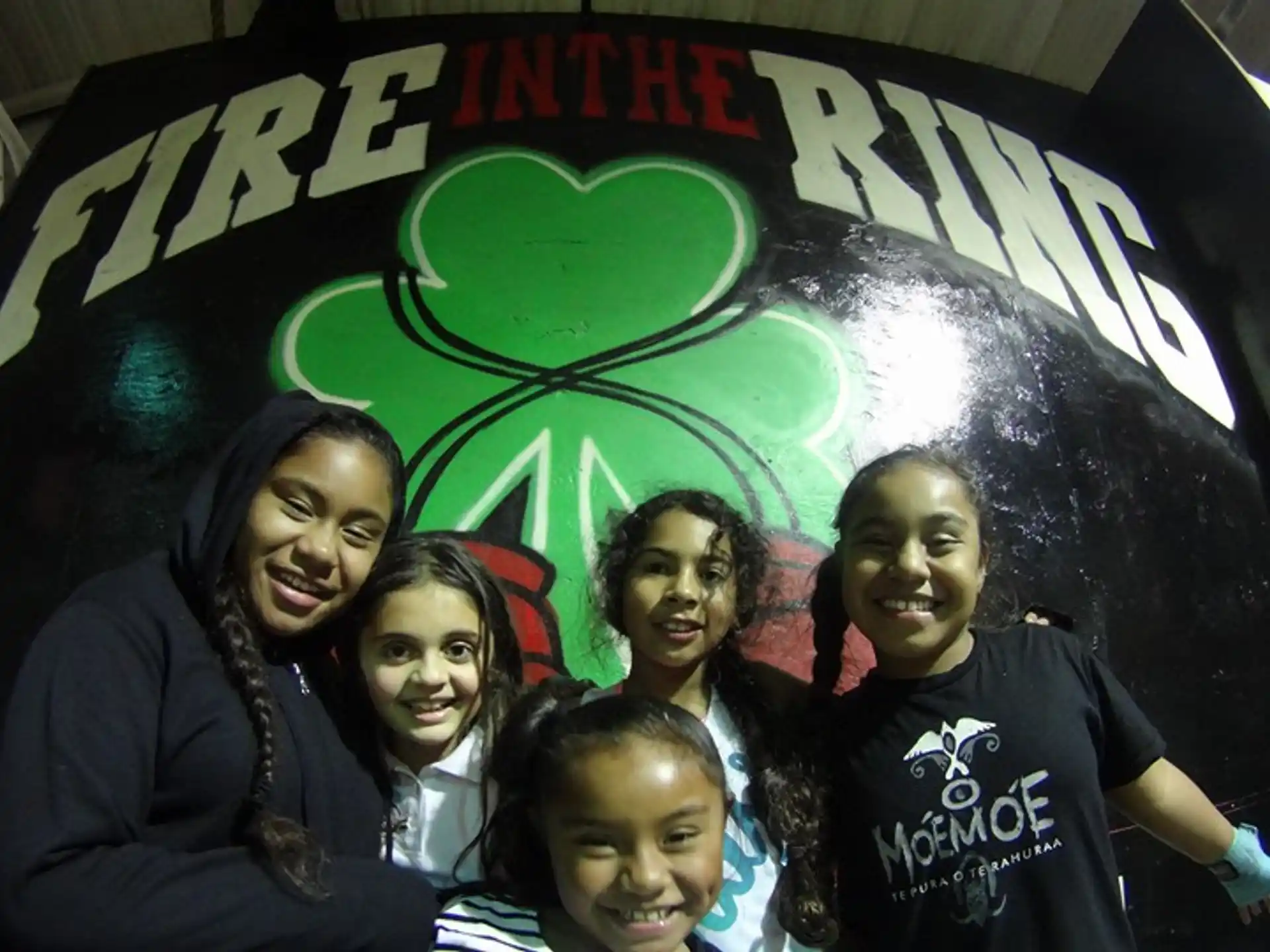 a group of people posing for a photo