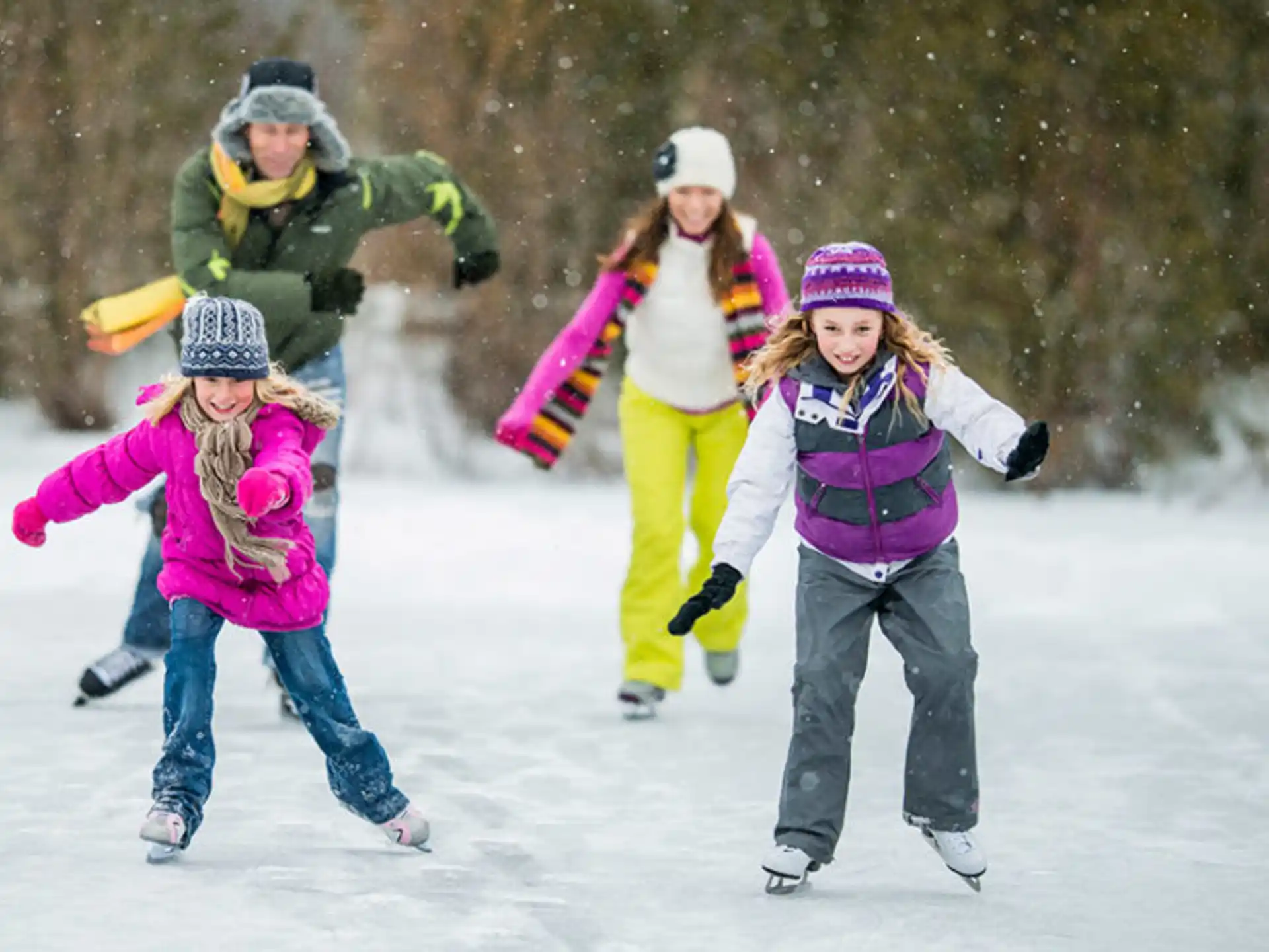 a group of people ice skating