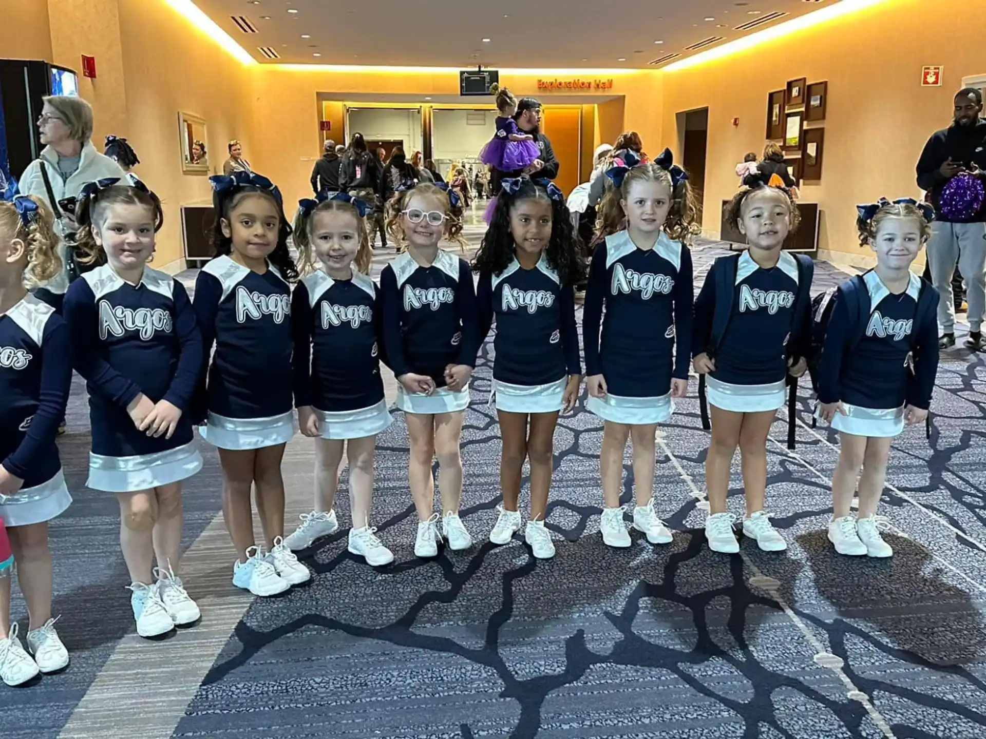 a group of girls in matching uniforms