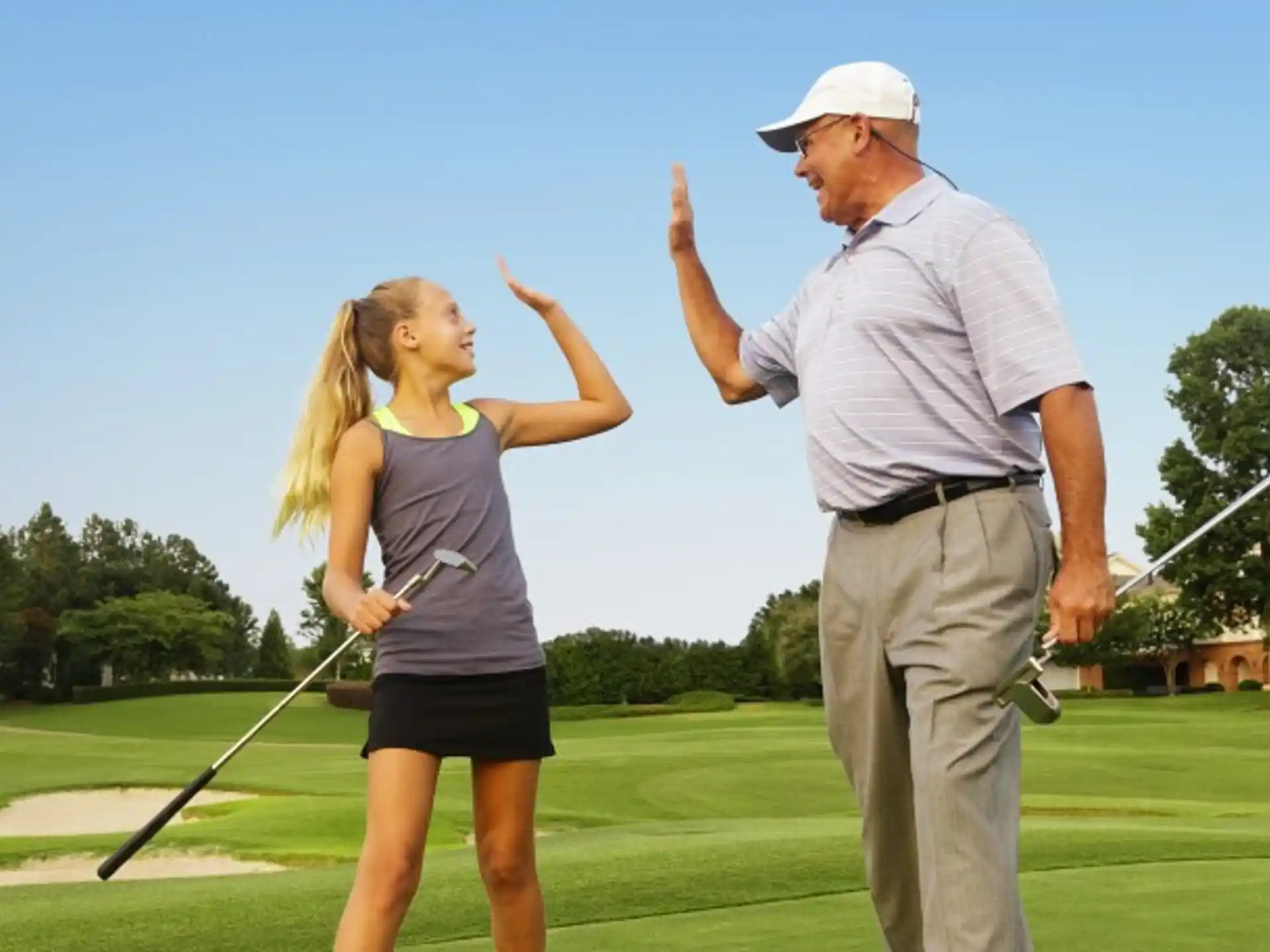 a man and a woman playing golf