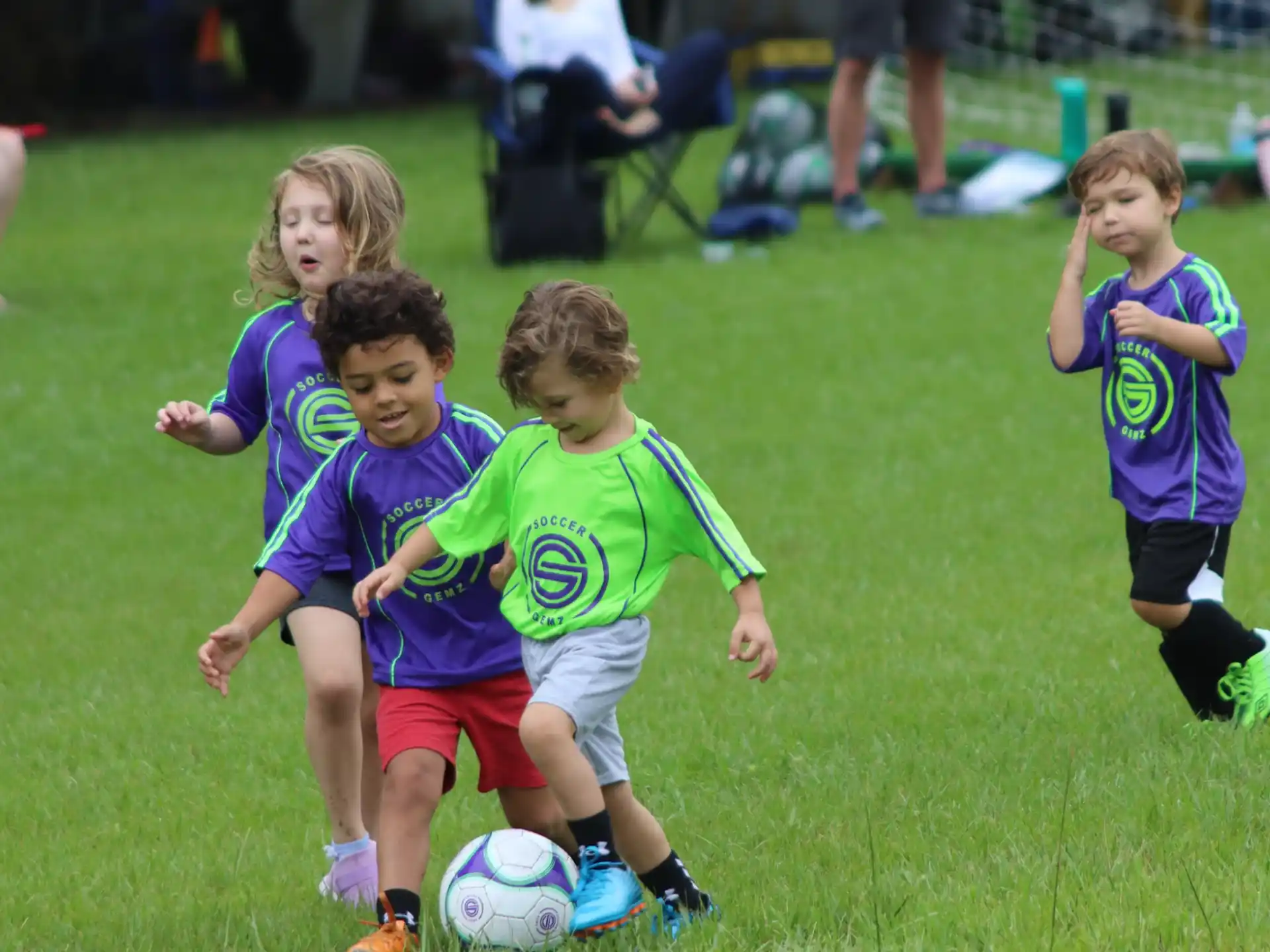 kids playing football on a field