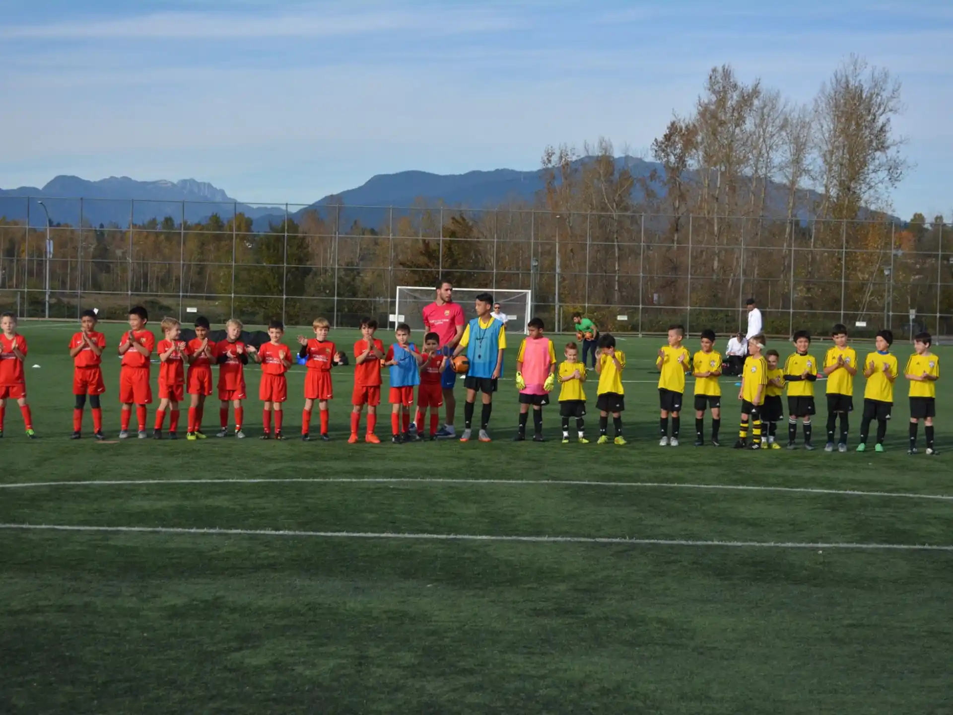 a group of football players standing on a field