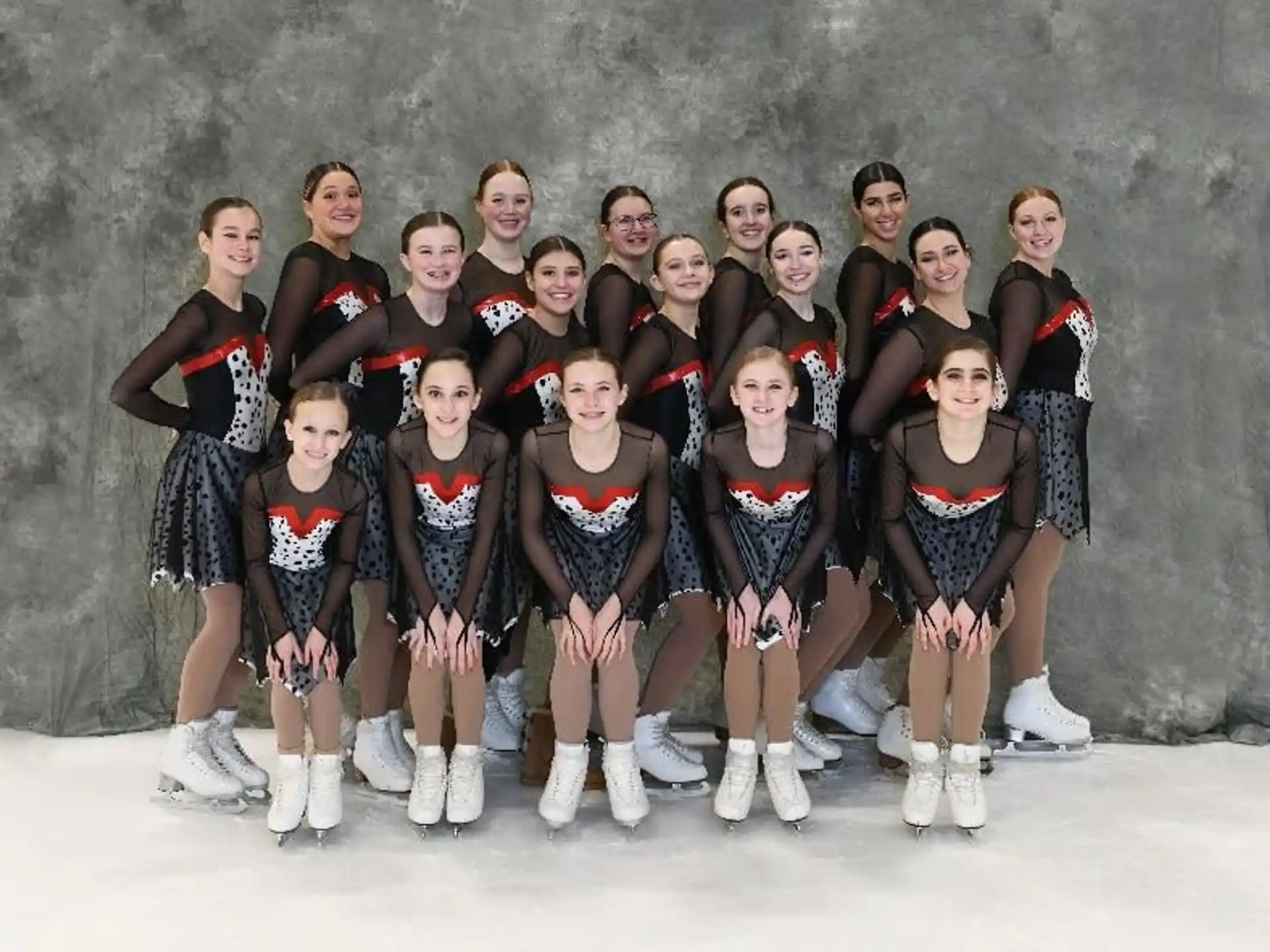 a group of women in matching outfits