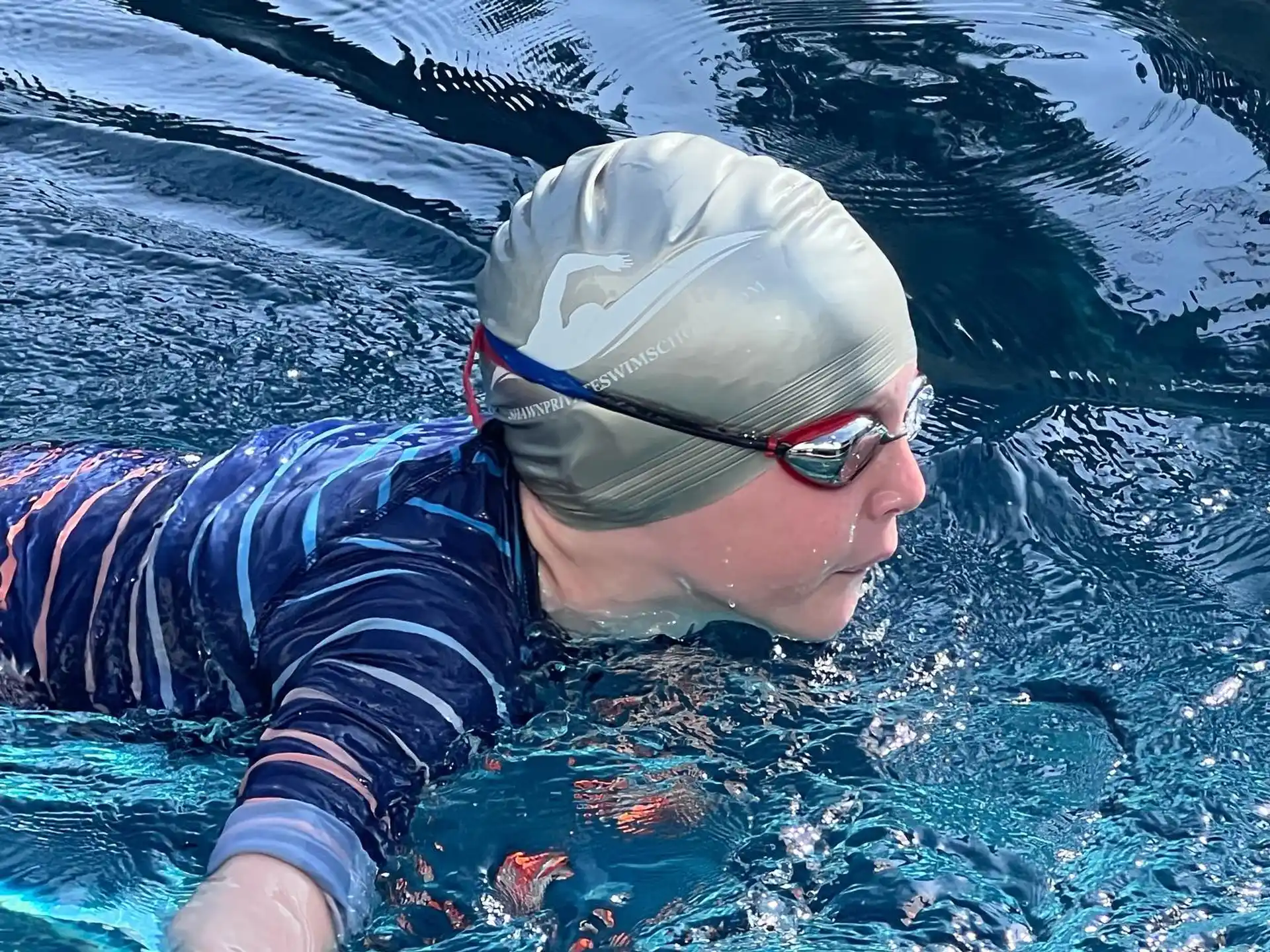 a person in a swimming pool