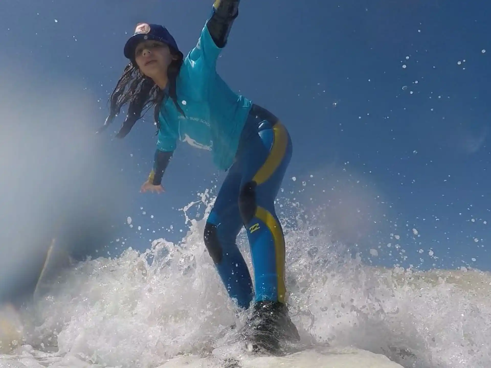 a person surfing on the waves