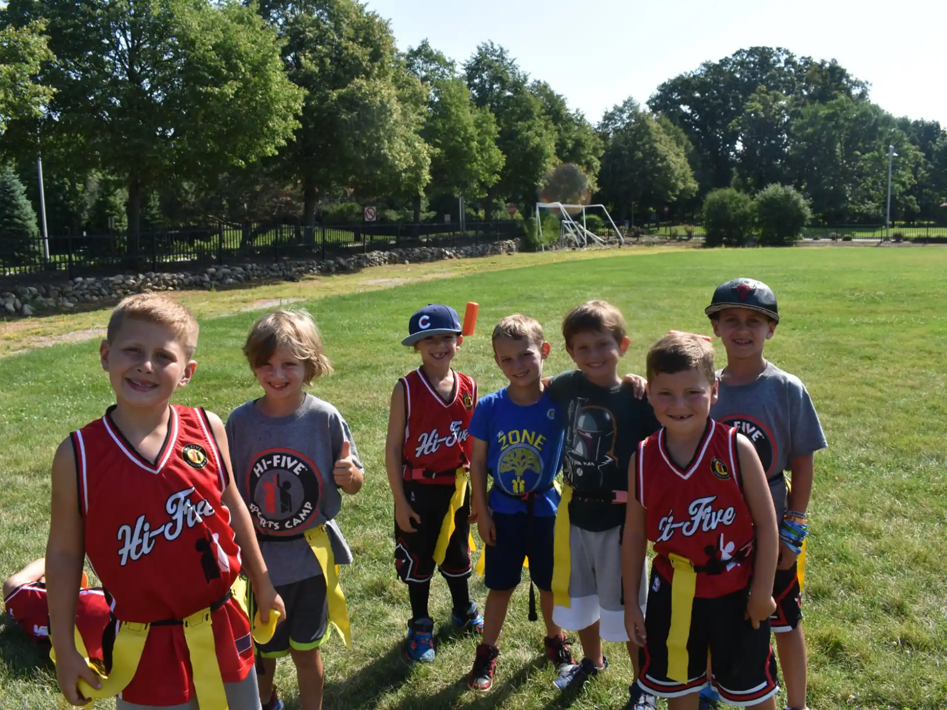 a group of boys in sports uniforms