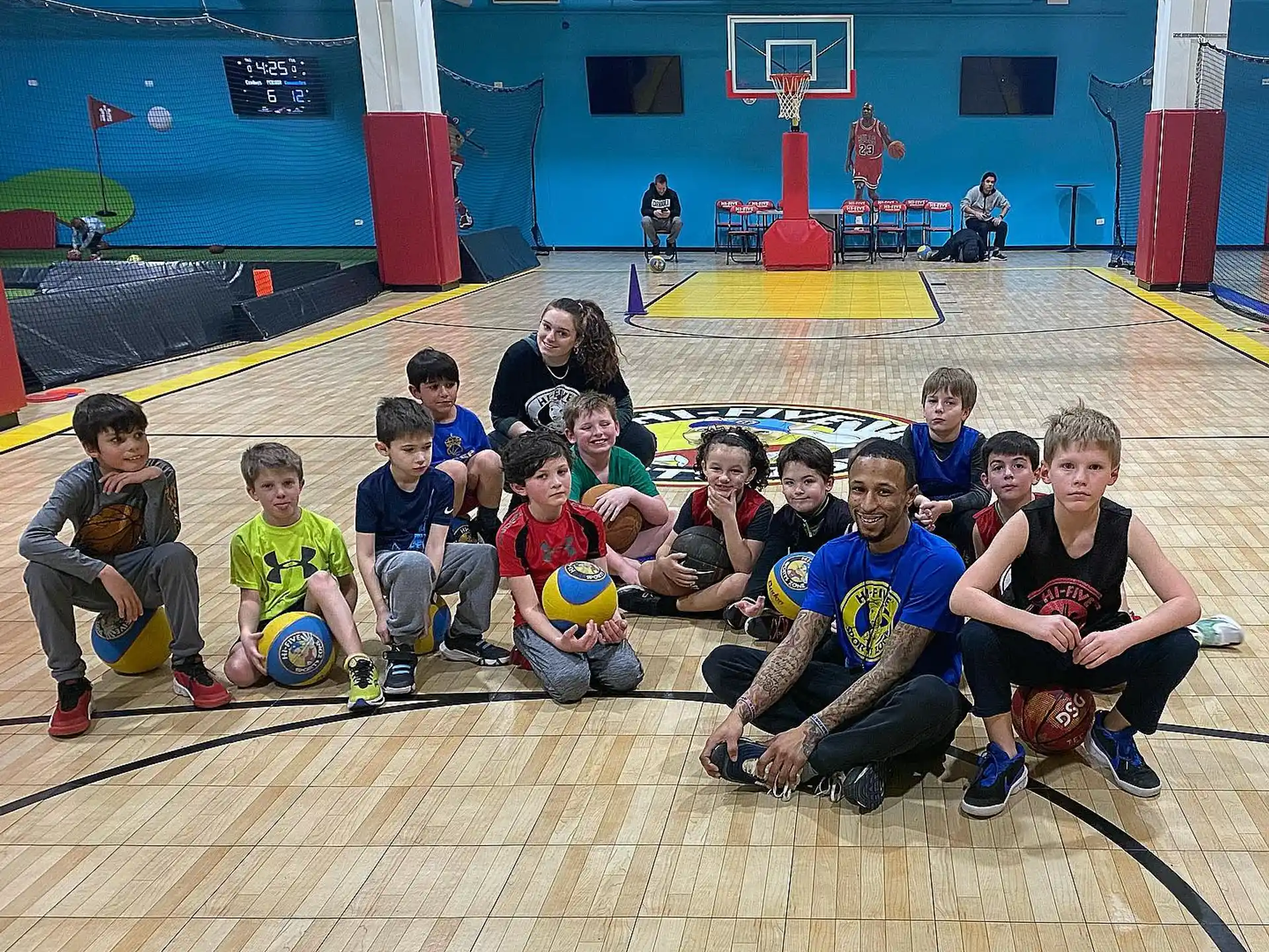 a group of kids posing for a photo