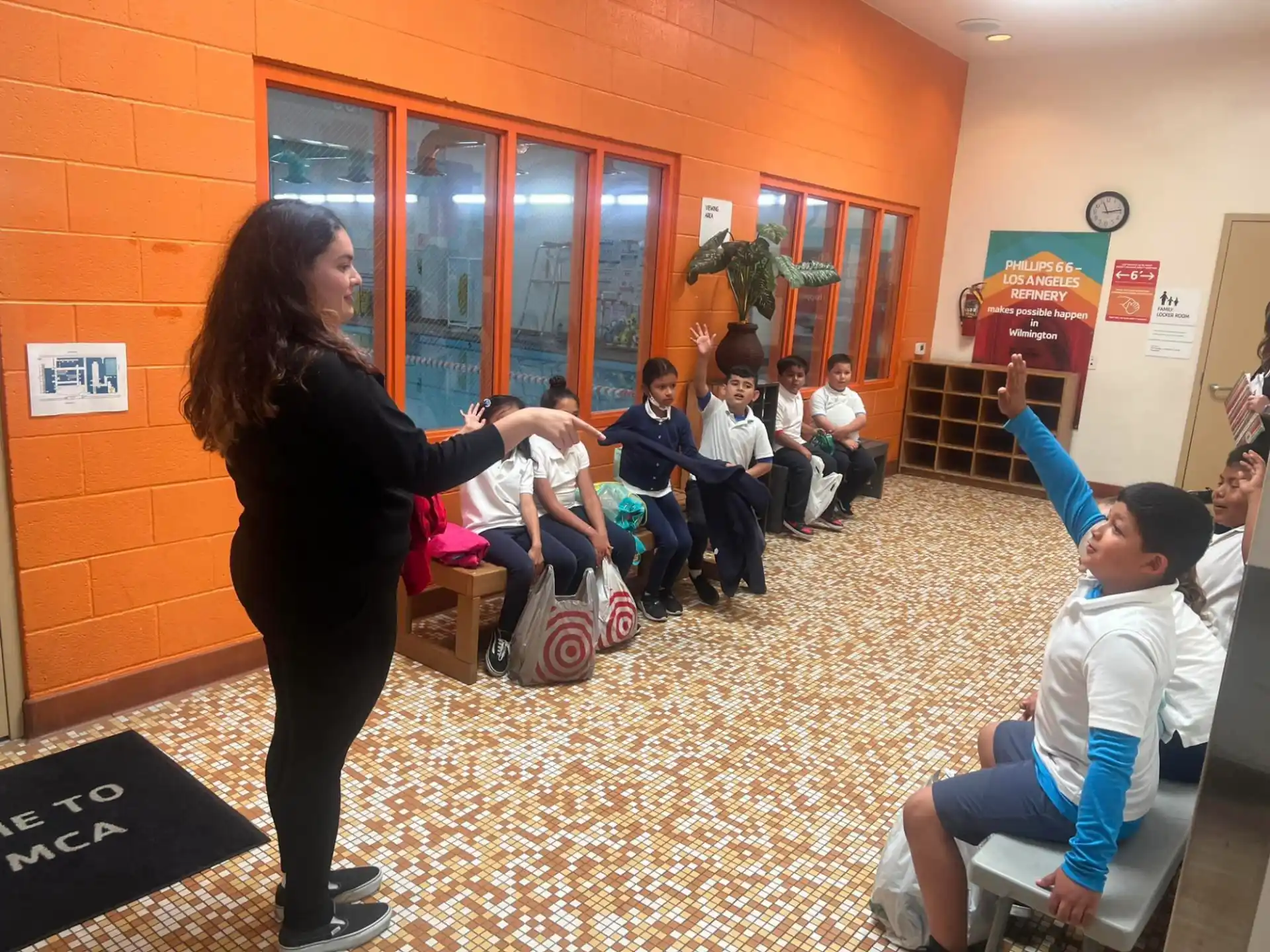 a person teaching children in a classroom
