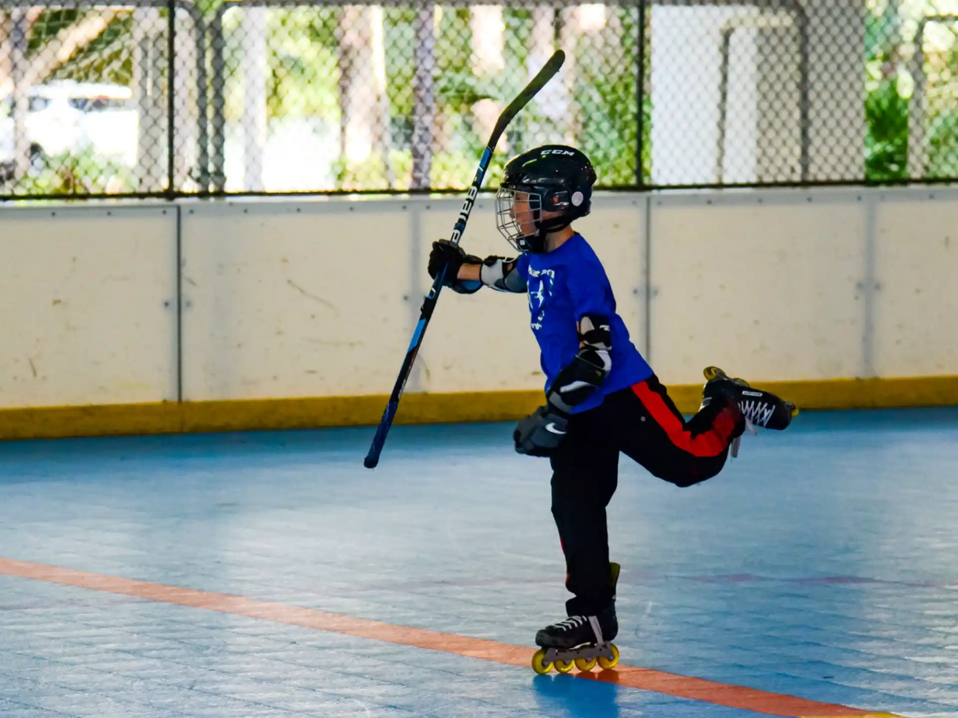 a young boy playing baseball