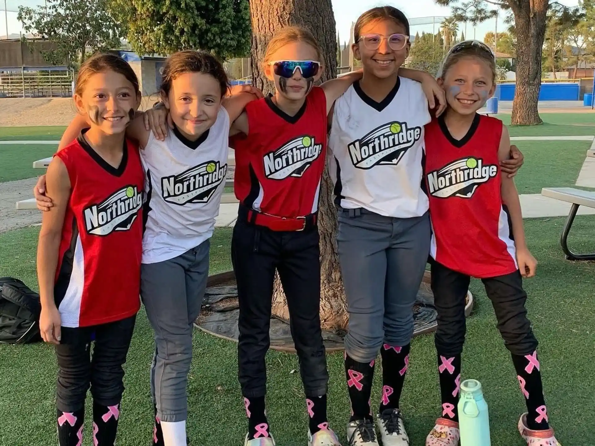 a group of girls posing for a photo