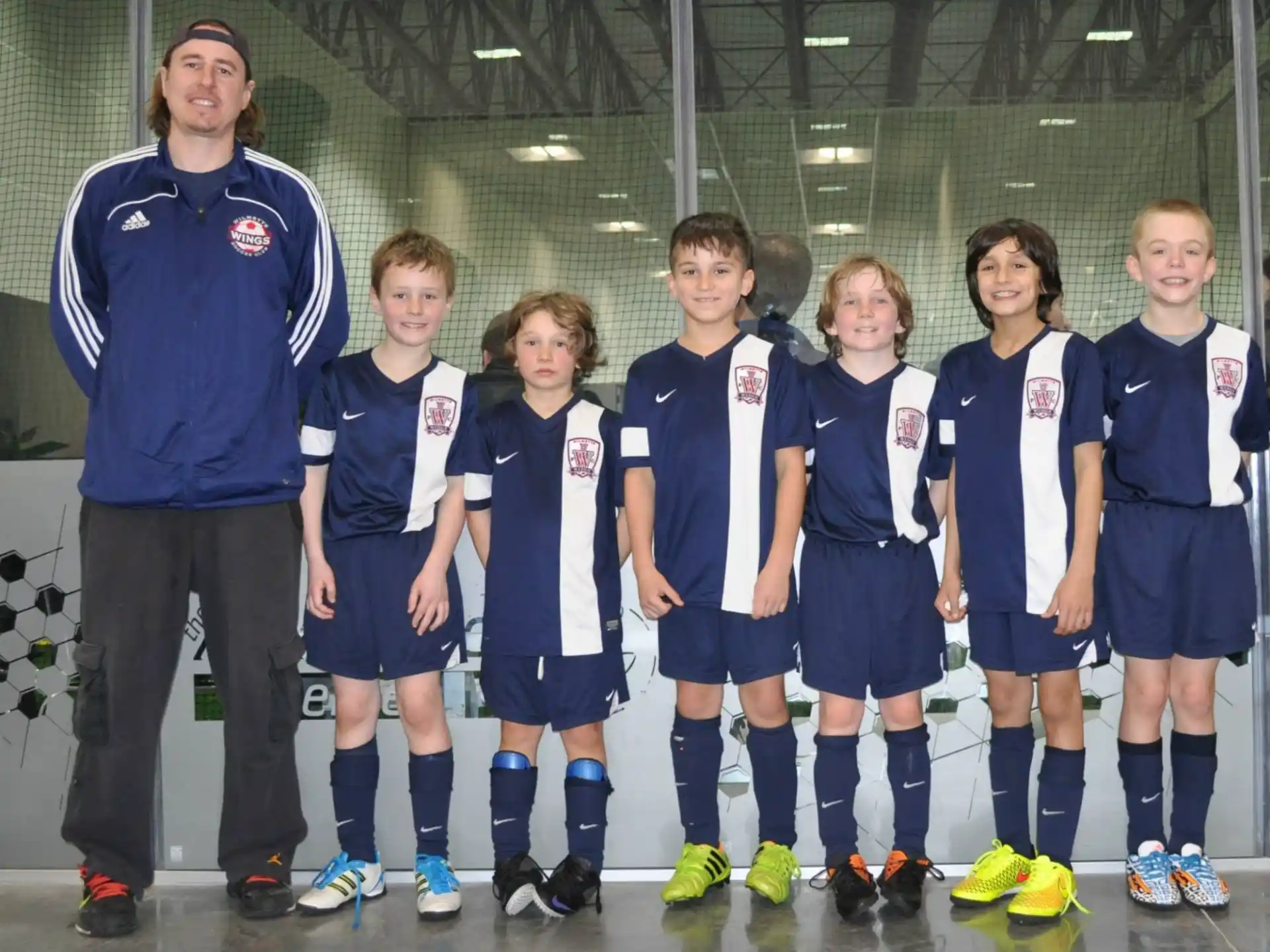 a group of people in sports uniforms