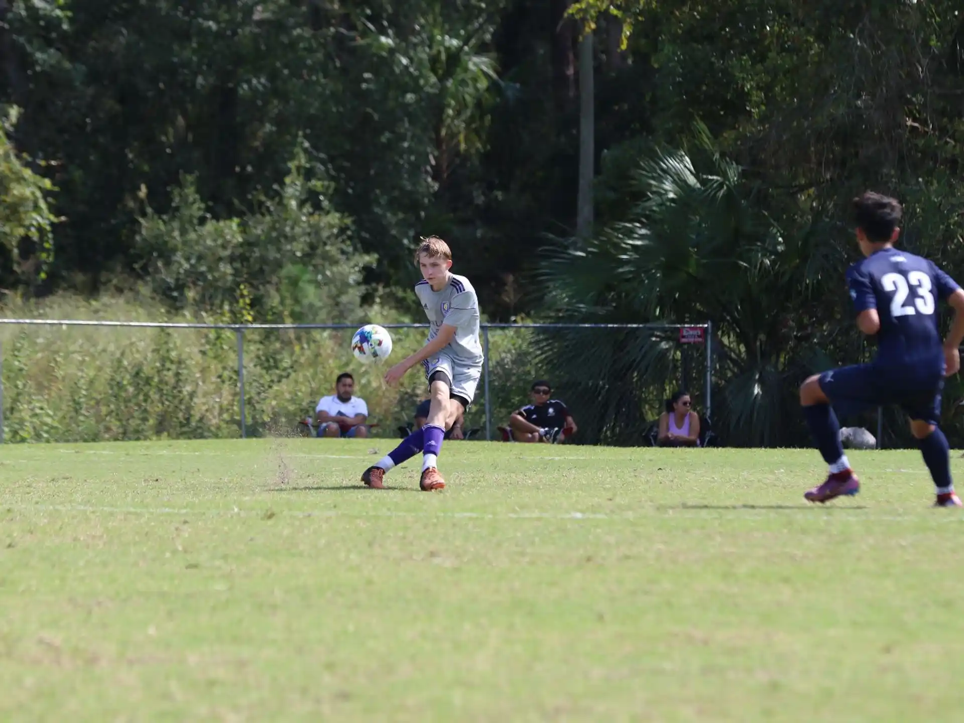 a group of people playing football