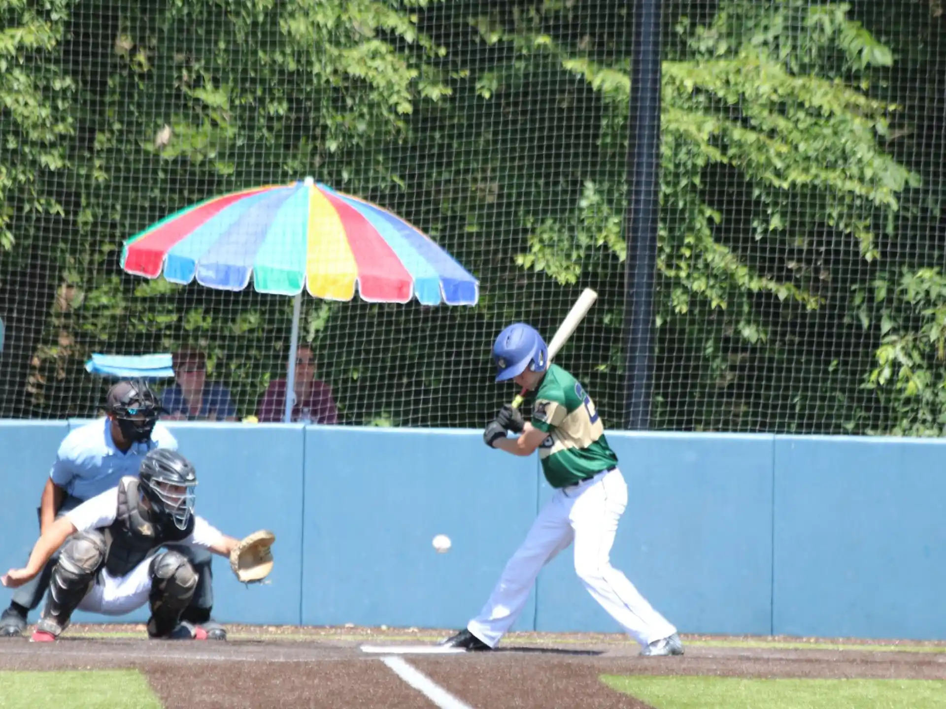 a baseball player swinging a bat