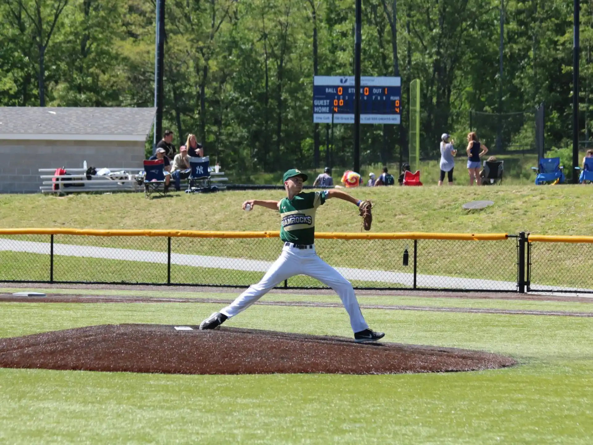 a baseball player throwing a ball