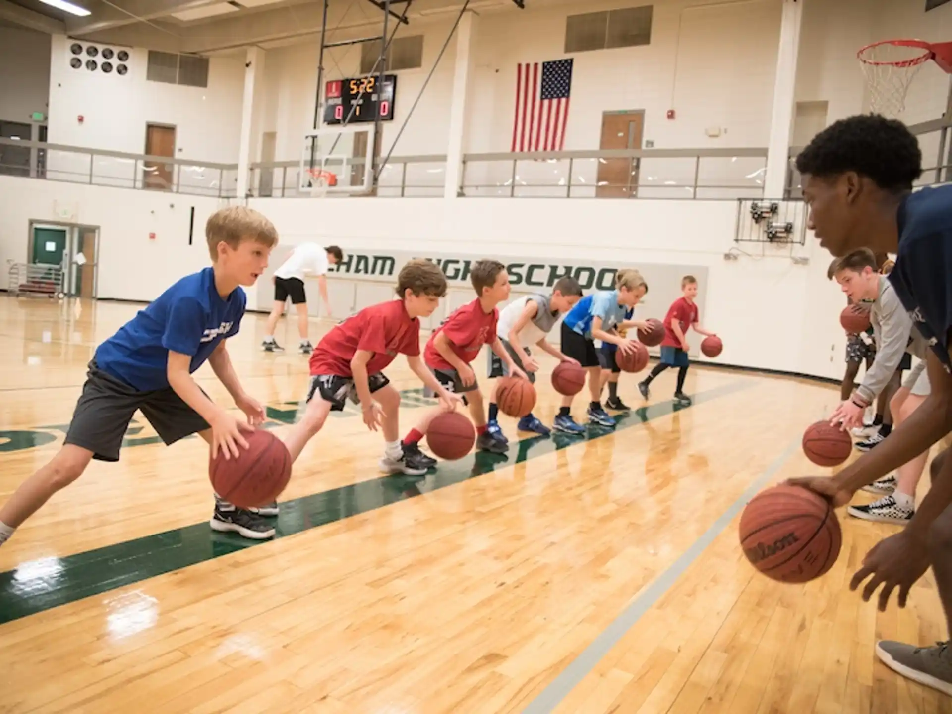 a group of kids playing basketball