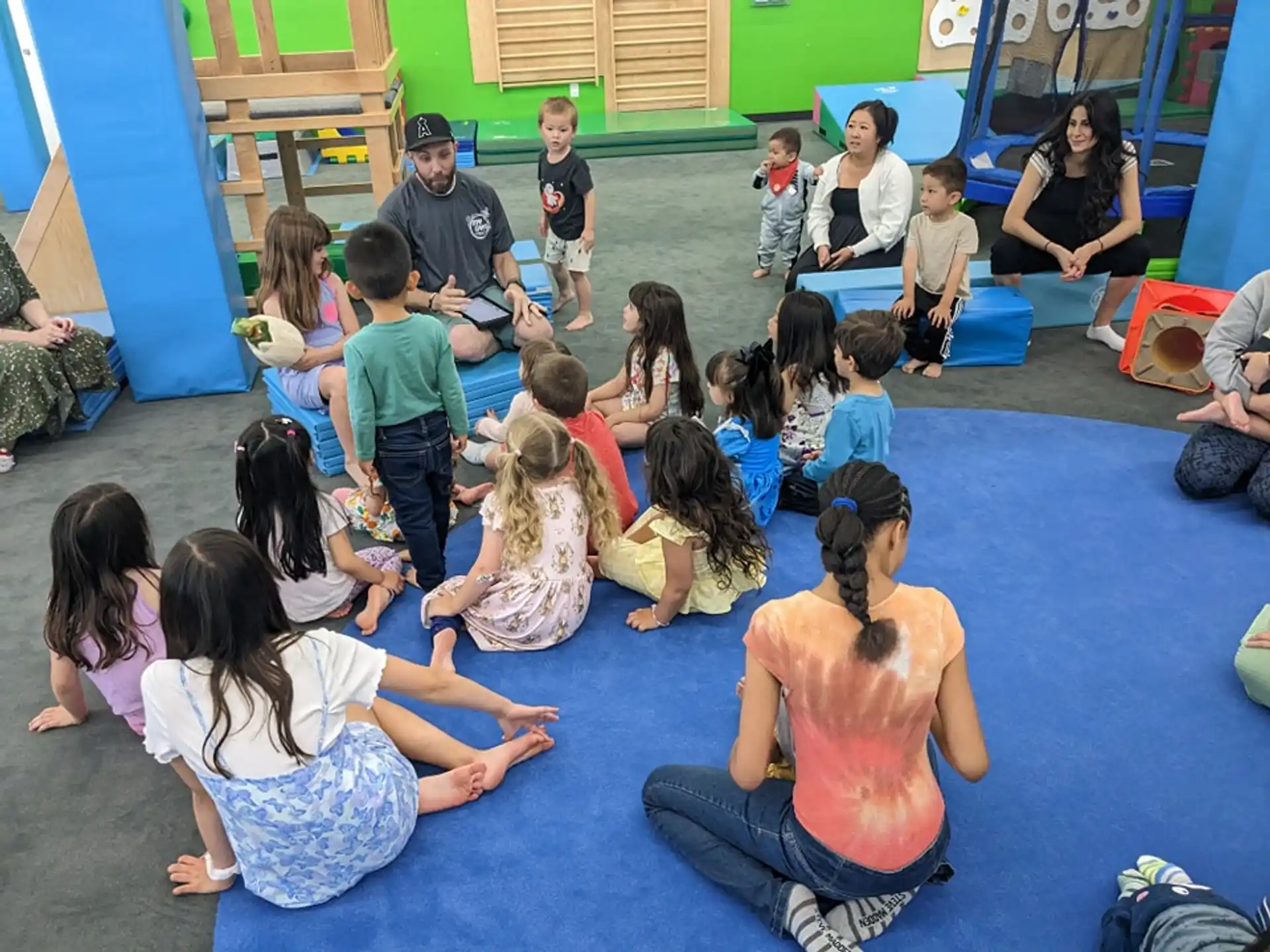 a group of people sitting on the floor