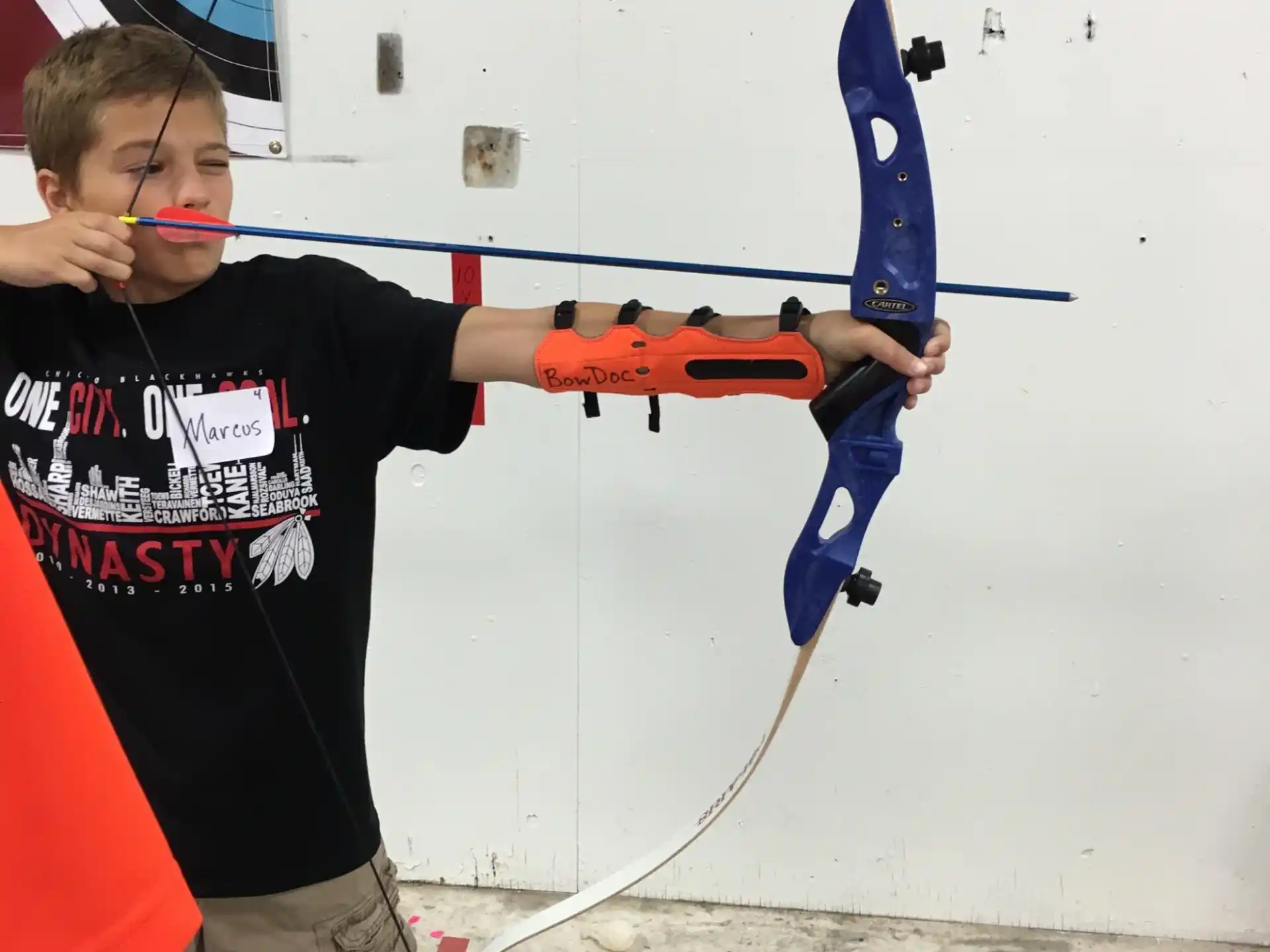 a boy holding a toy gun