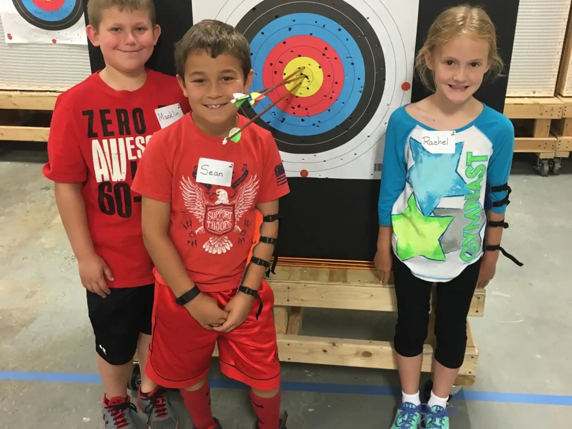 a group of kids posing for a photo
