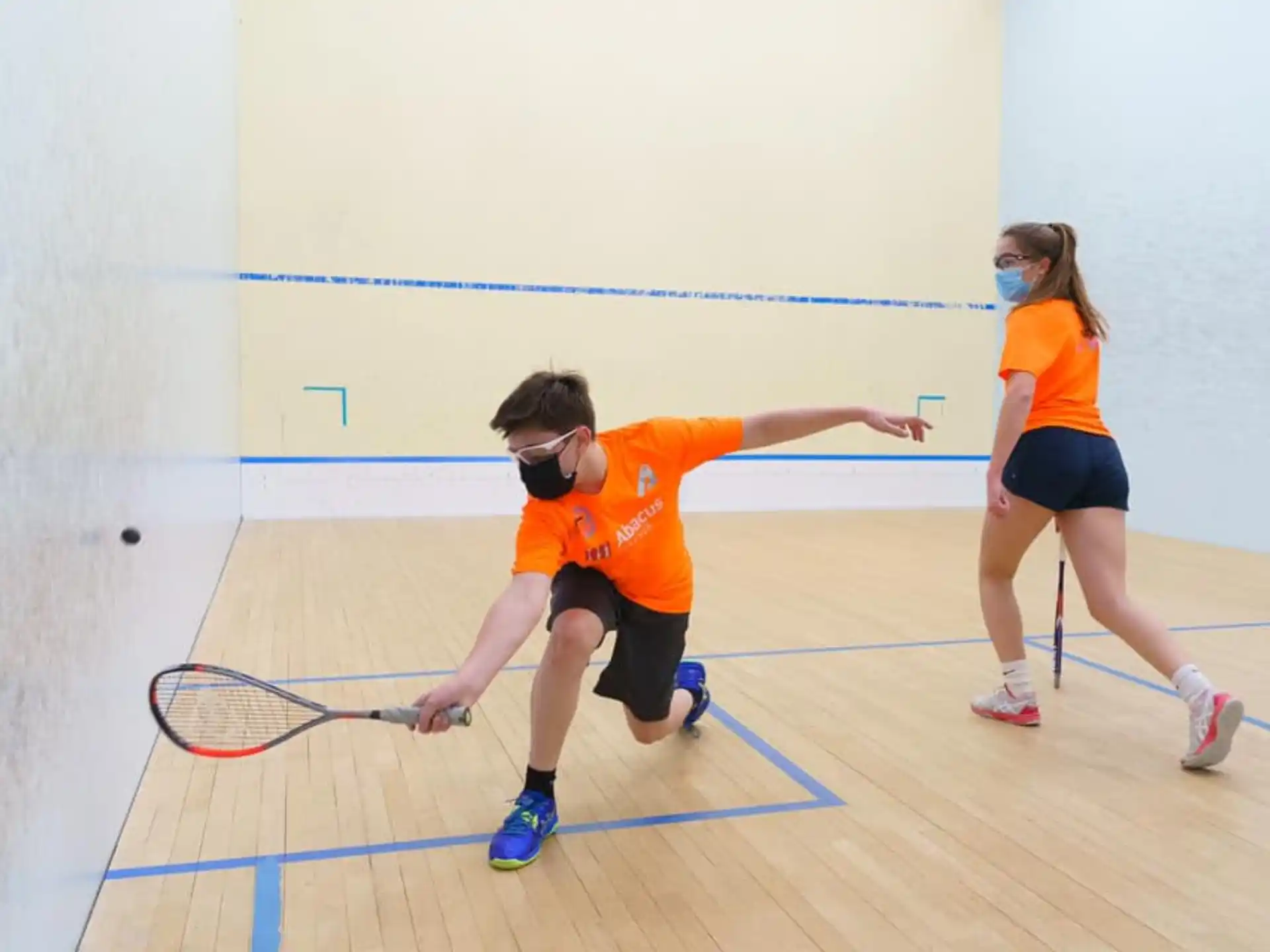 a couple of people playing a sport