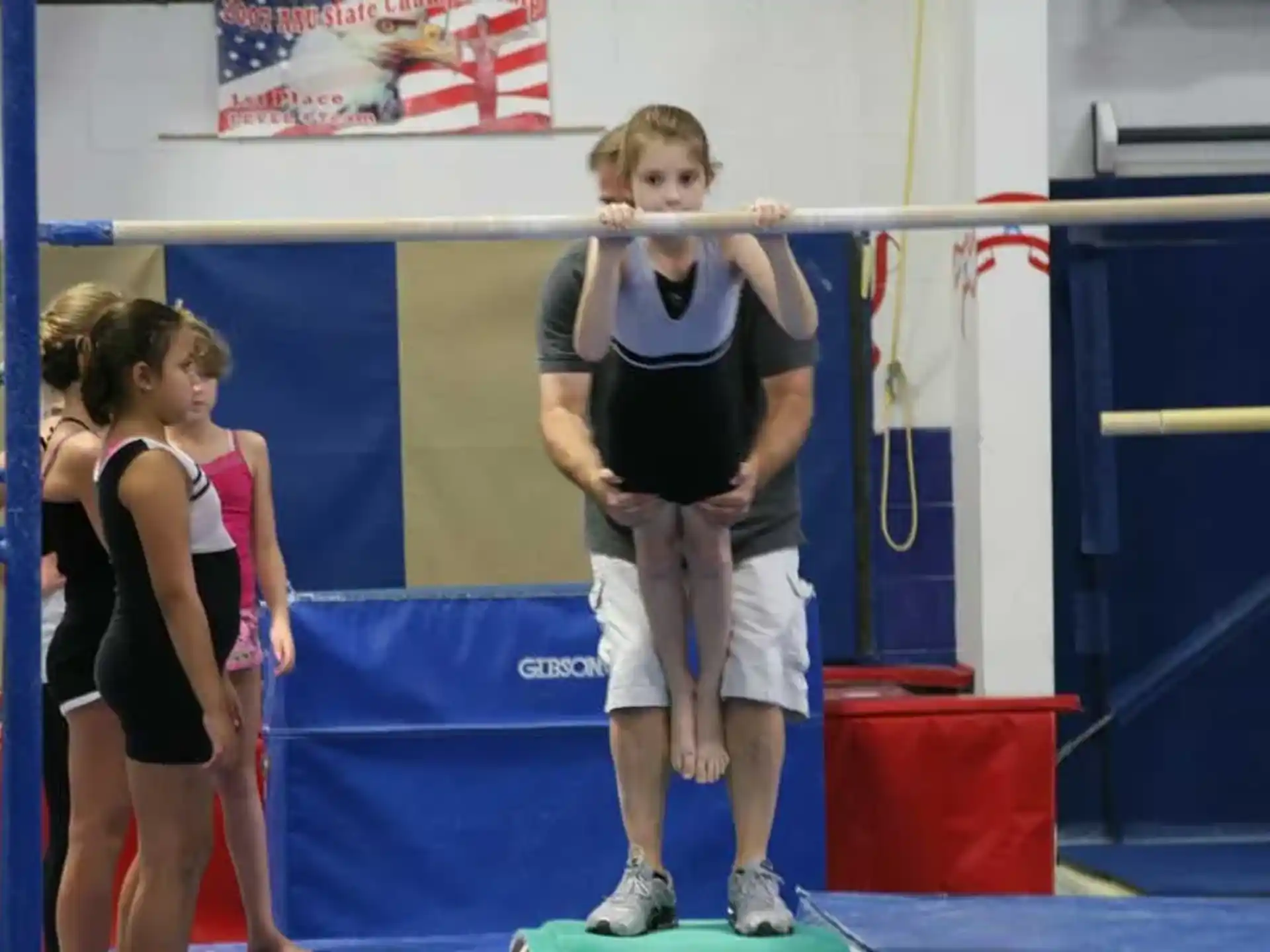 a group of people in a gym