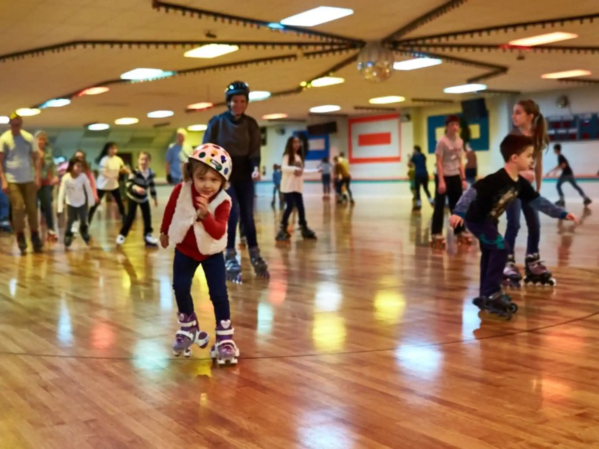 a group of people in a bowling alley