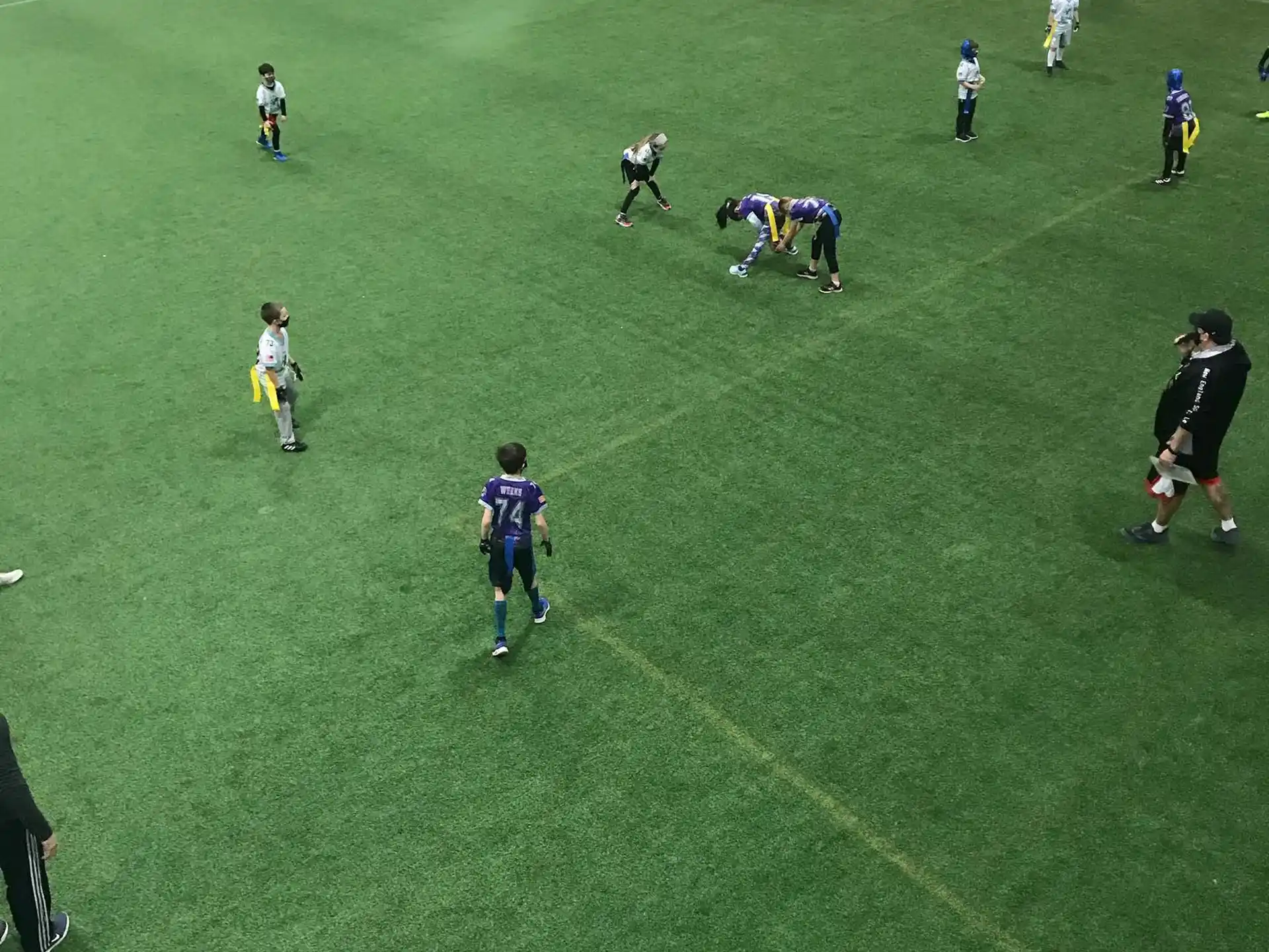 a group of people playing football
