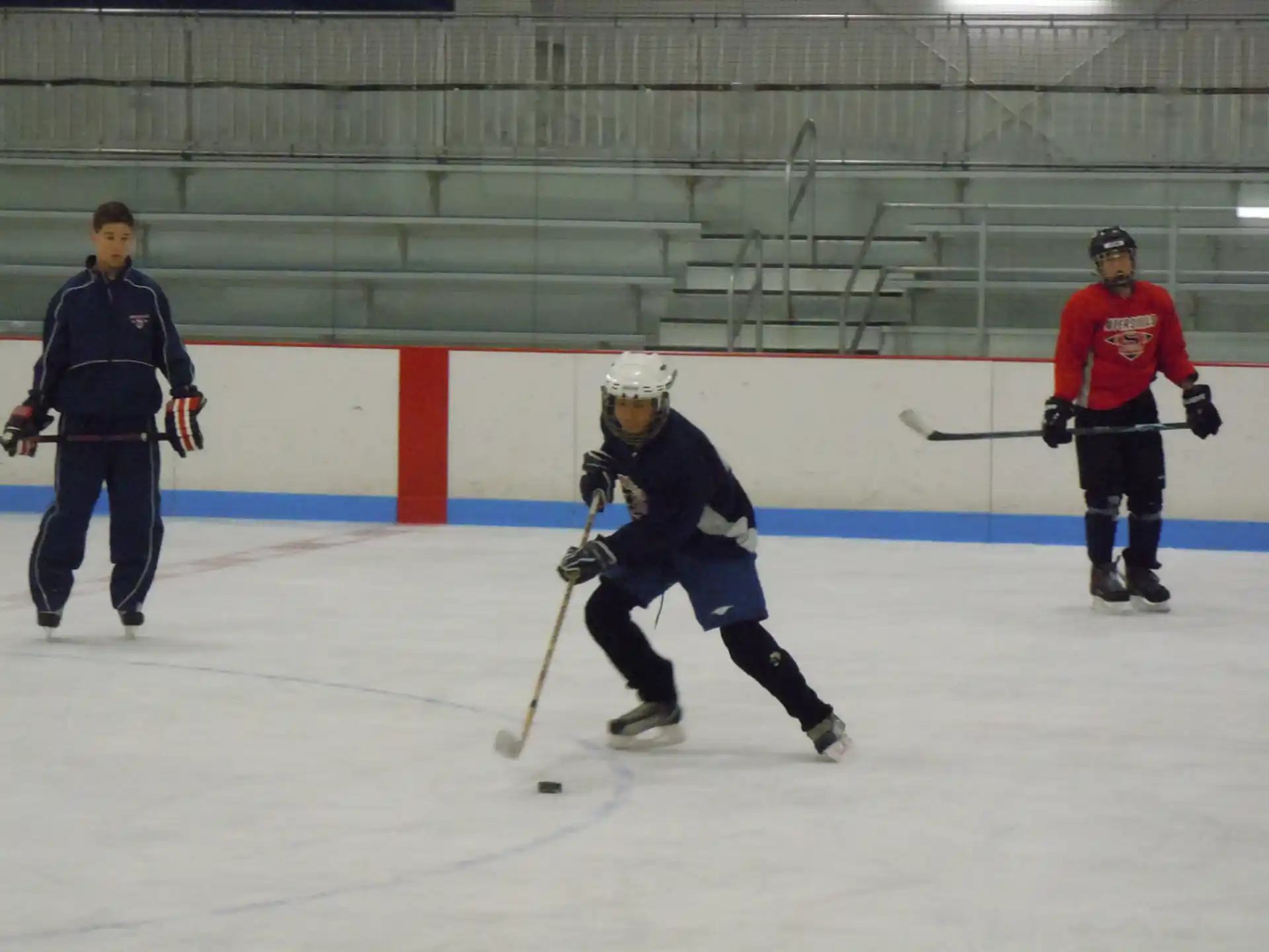 a hockey player in a blue uniform