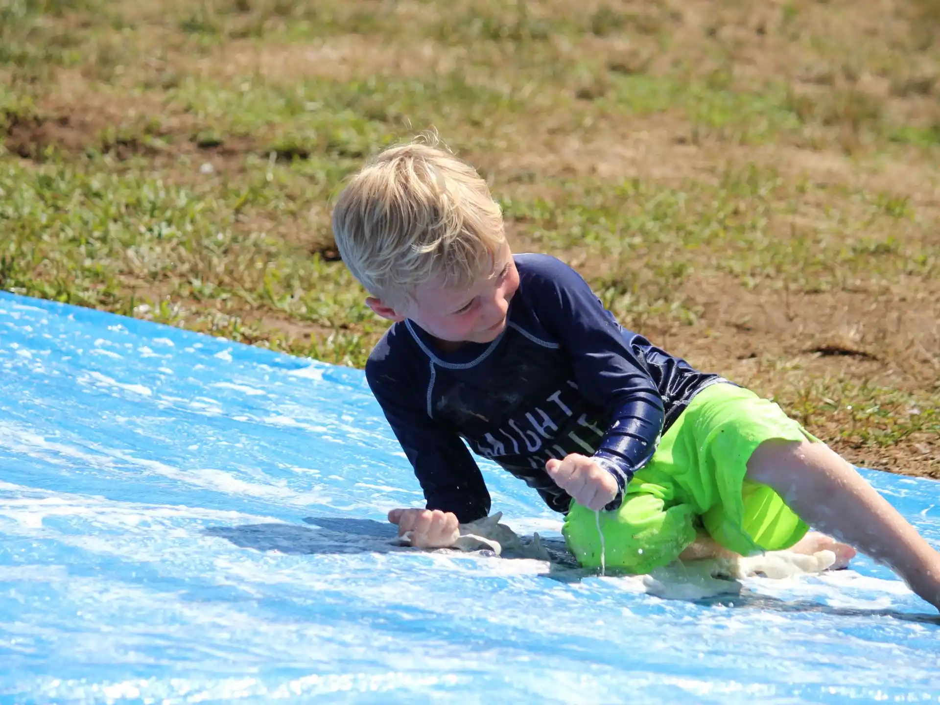 a boy in a pool