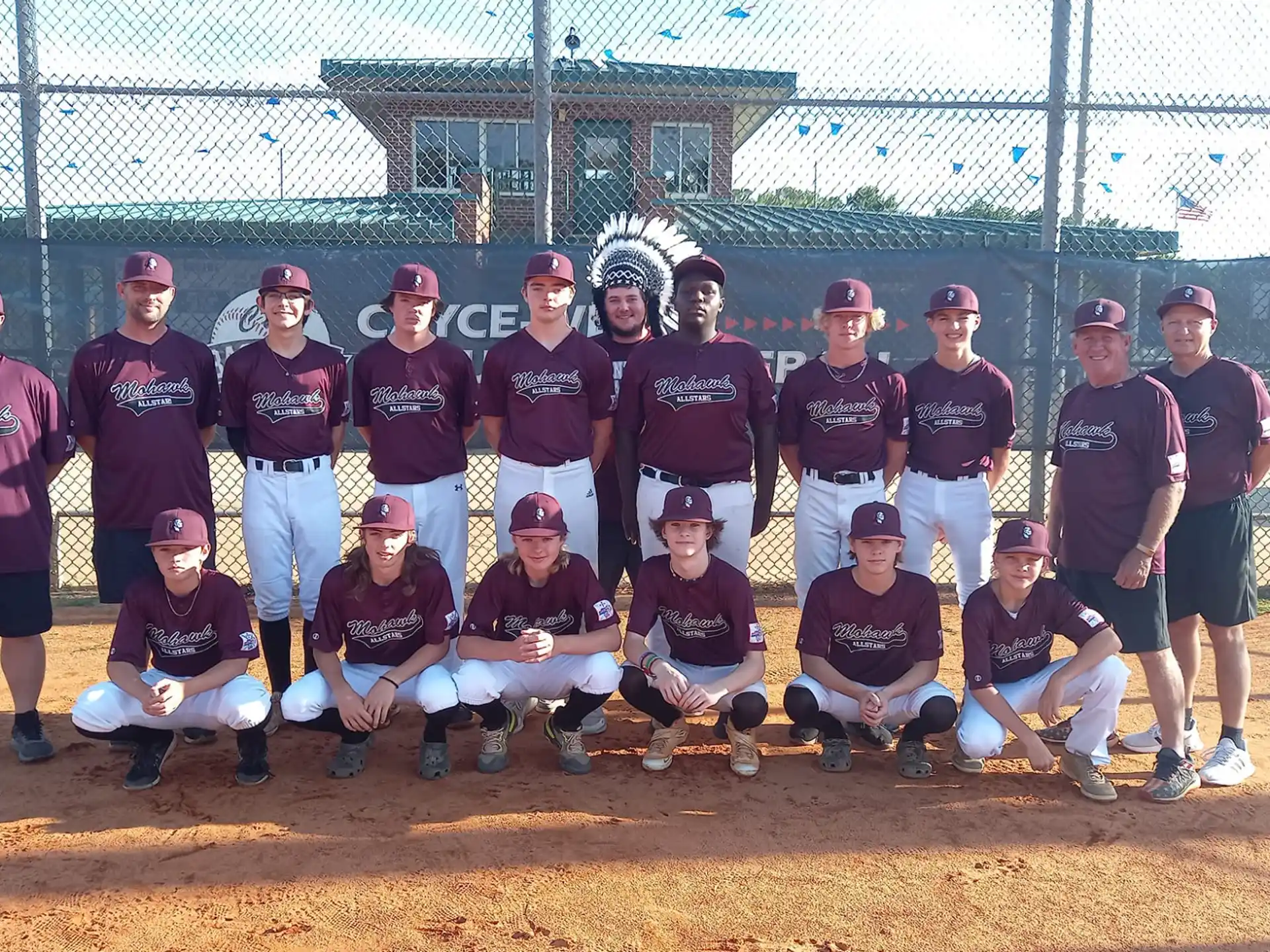 a group of baseball players posing for a photo