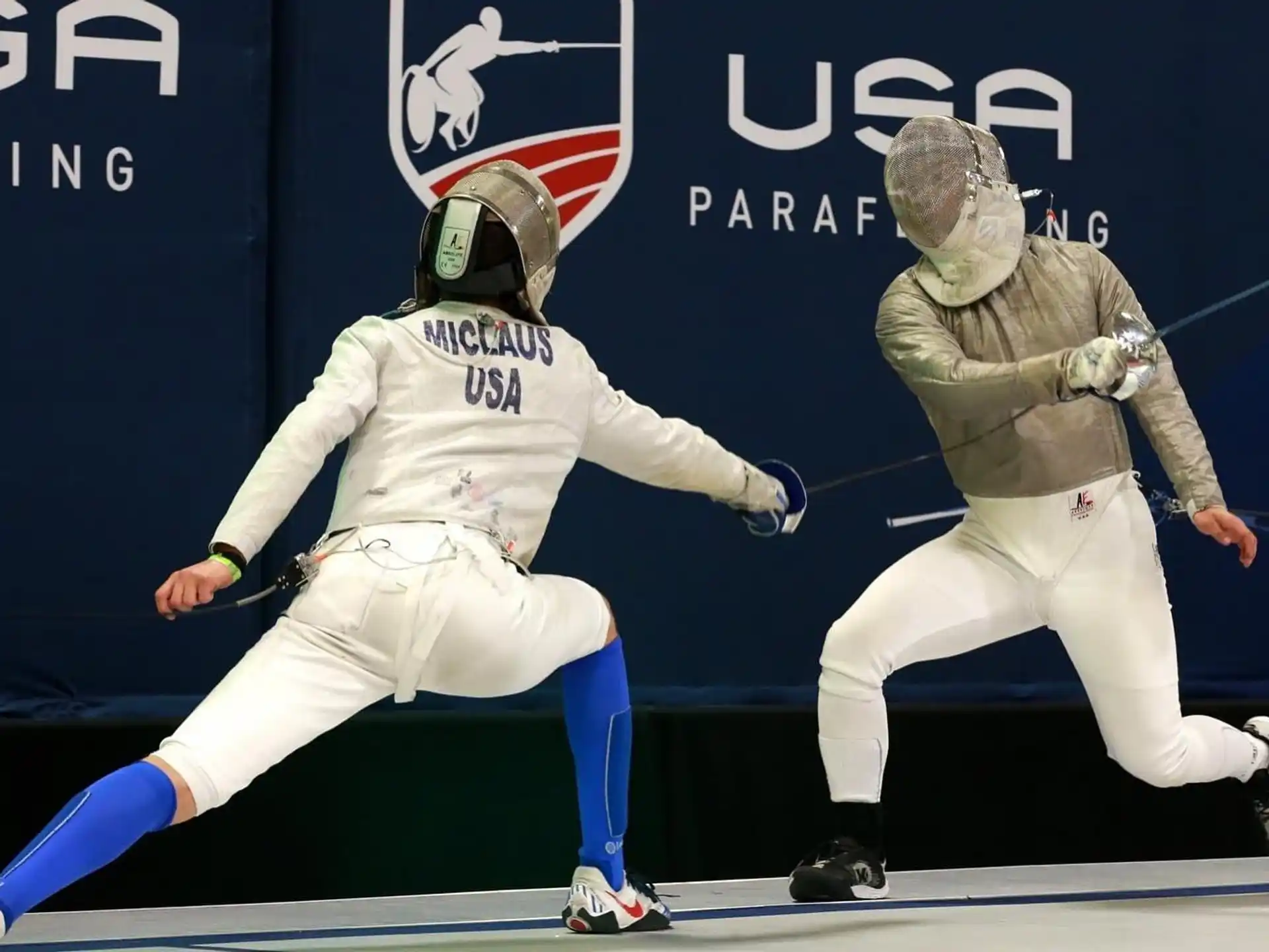 two people in white uniforms