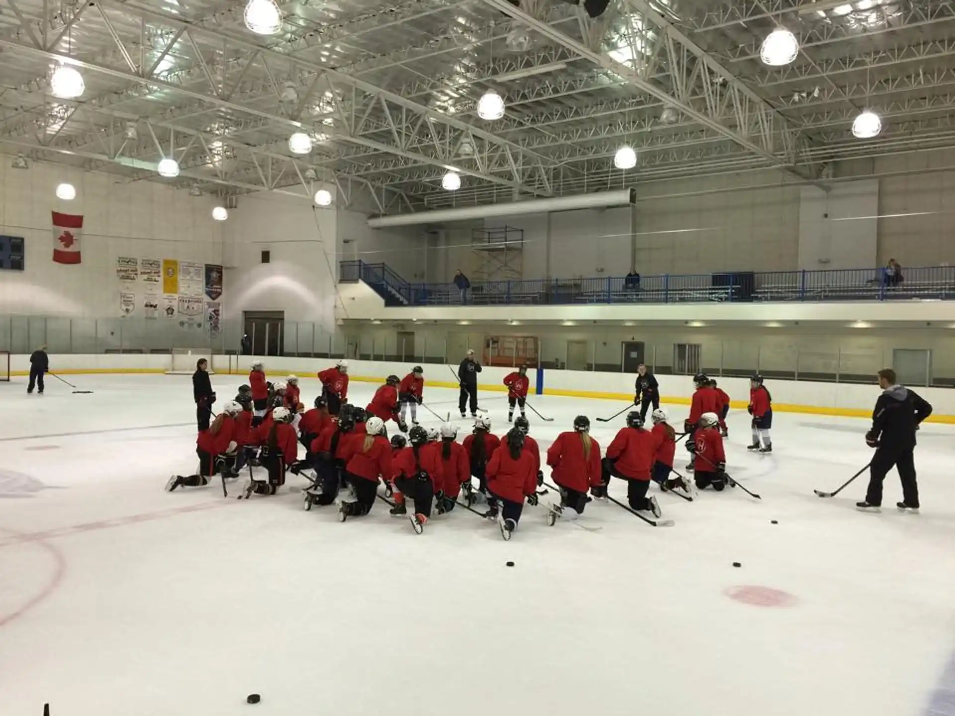 a group of people on an ice rink