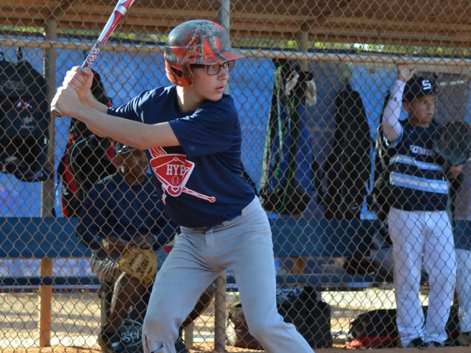 a young boy playing baseball