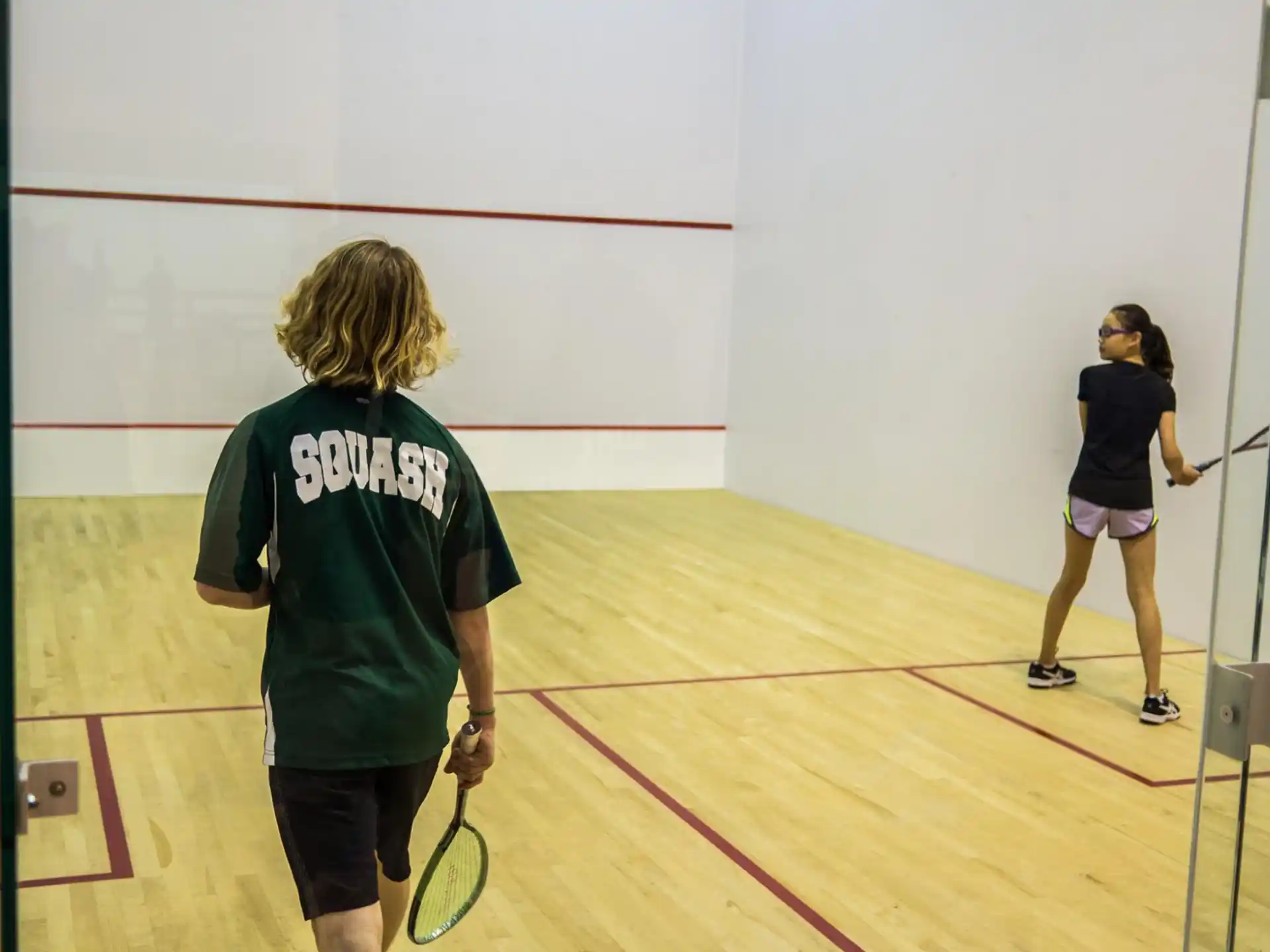 a couple of women playing tennis