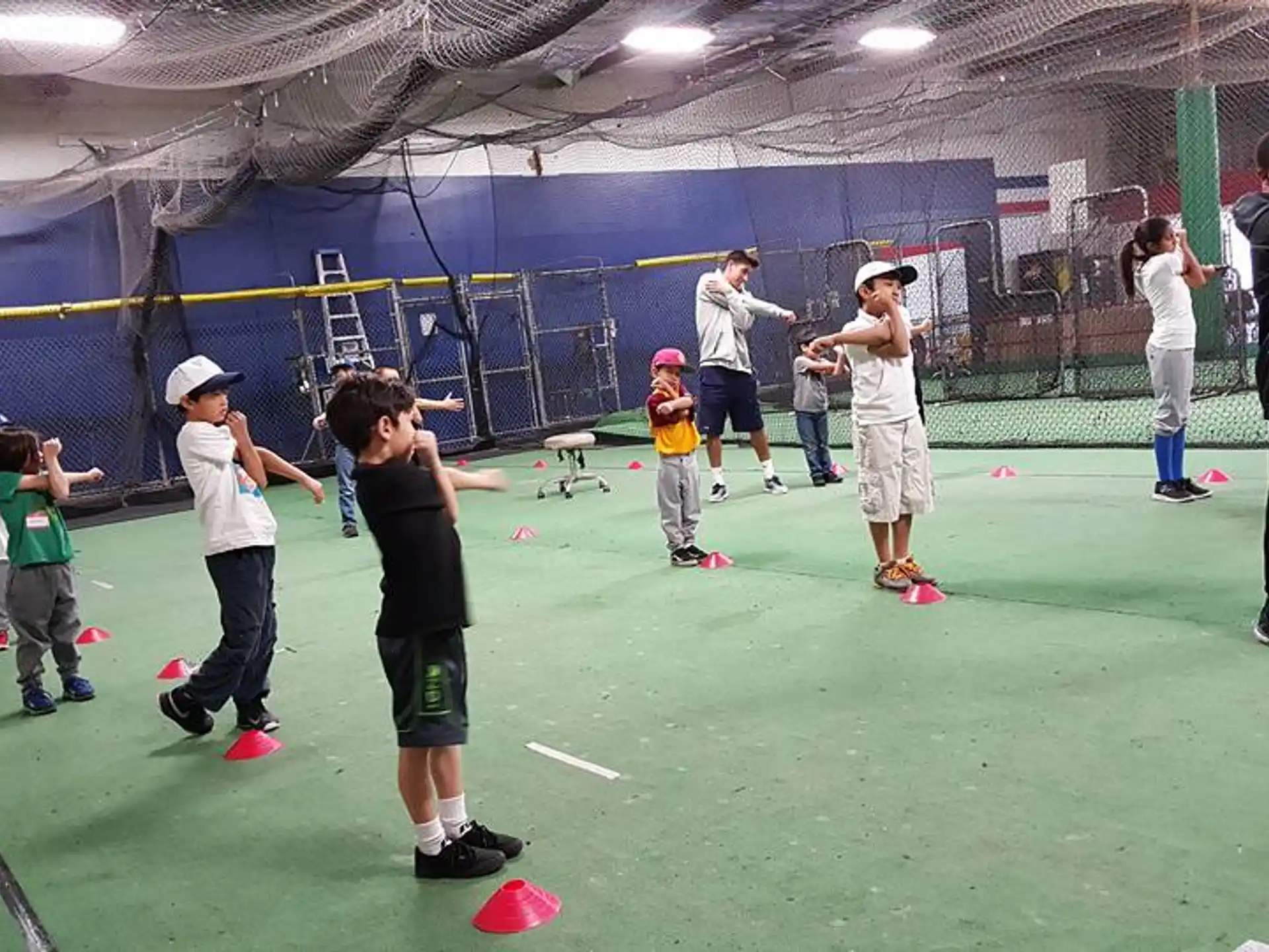 a group of kids playing with balls