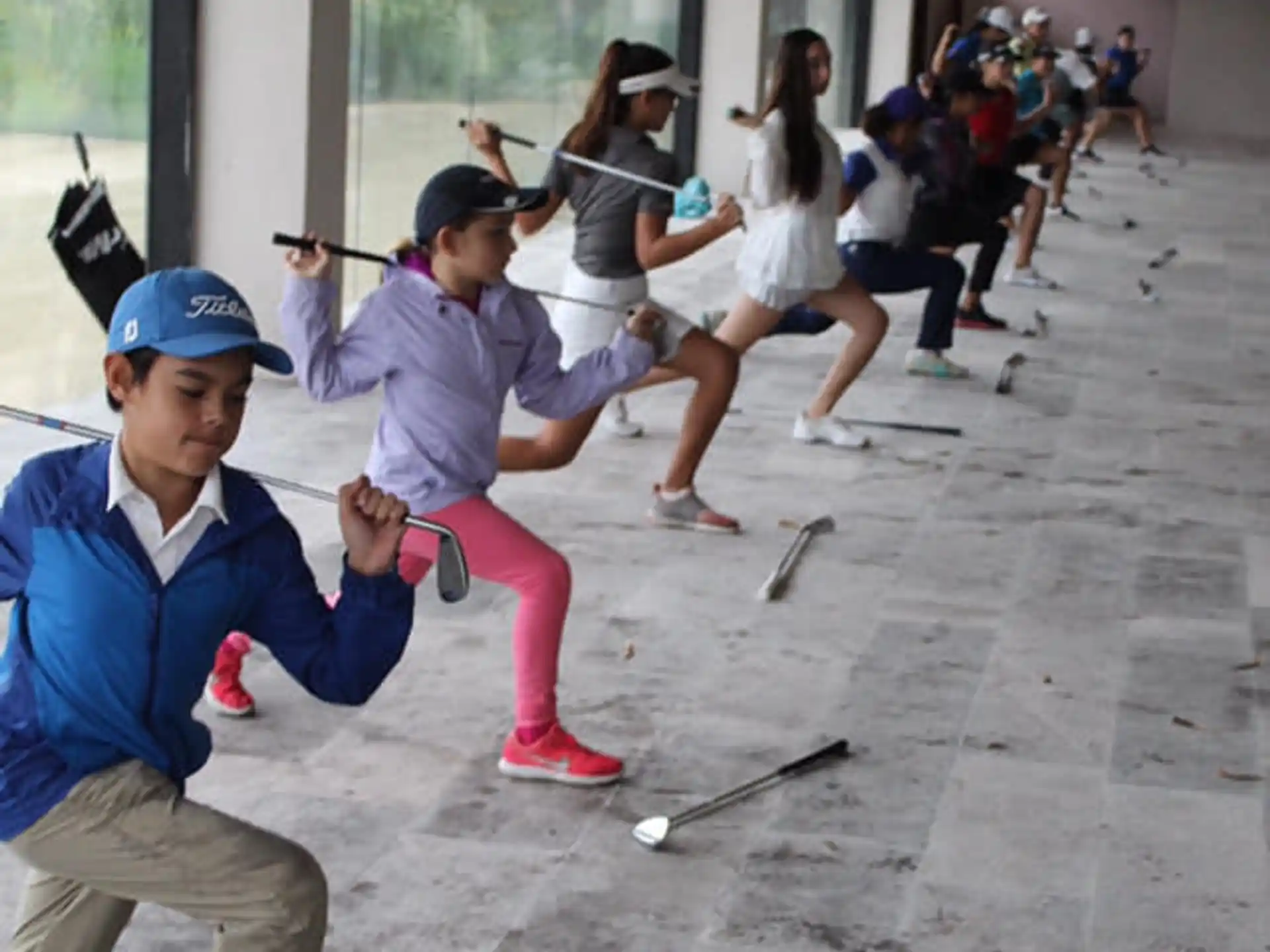 a group of people playing golf