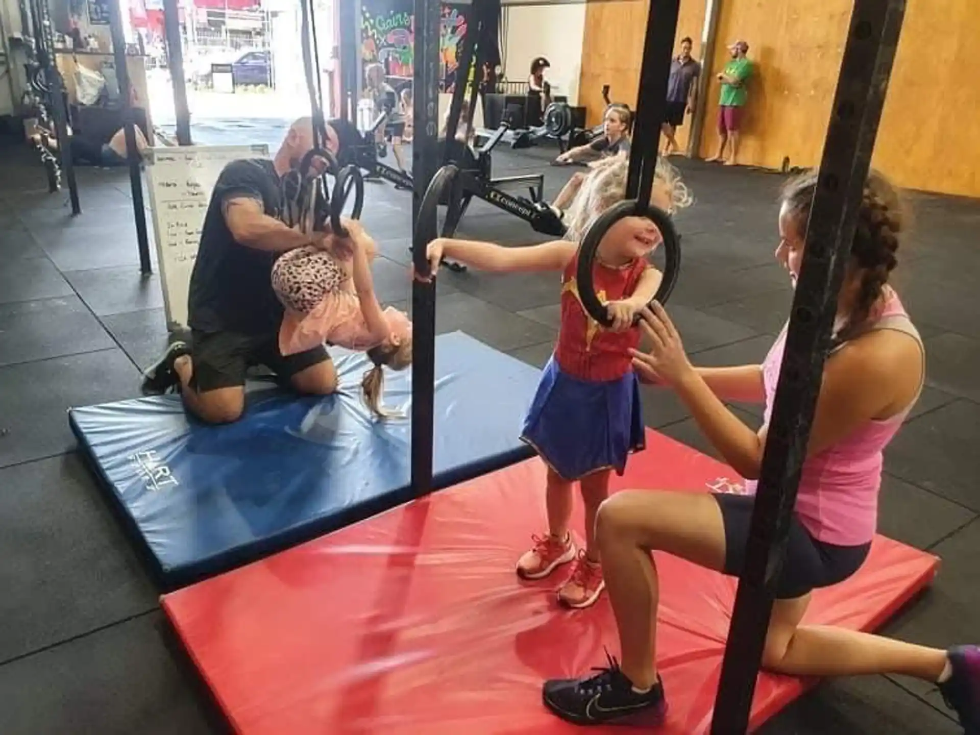 a group of people sitting on a mat