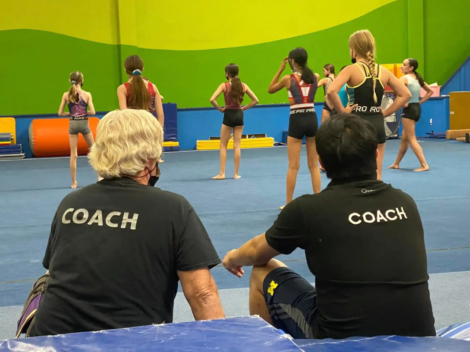 a group of people in a gym