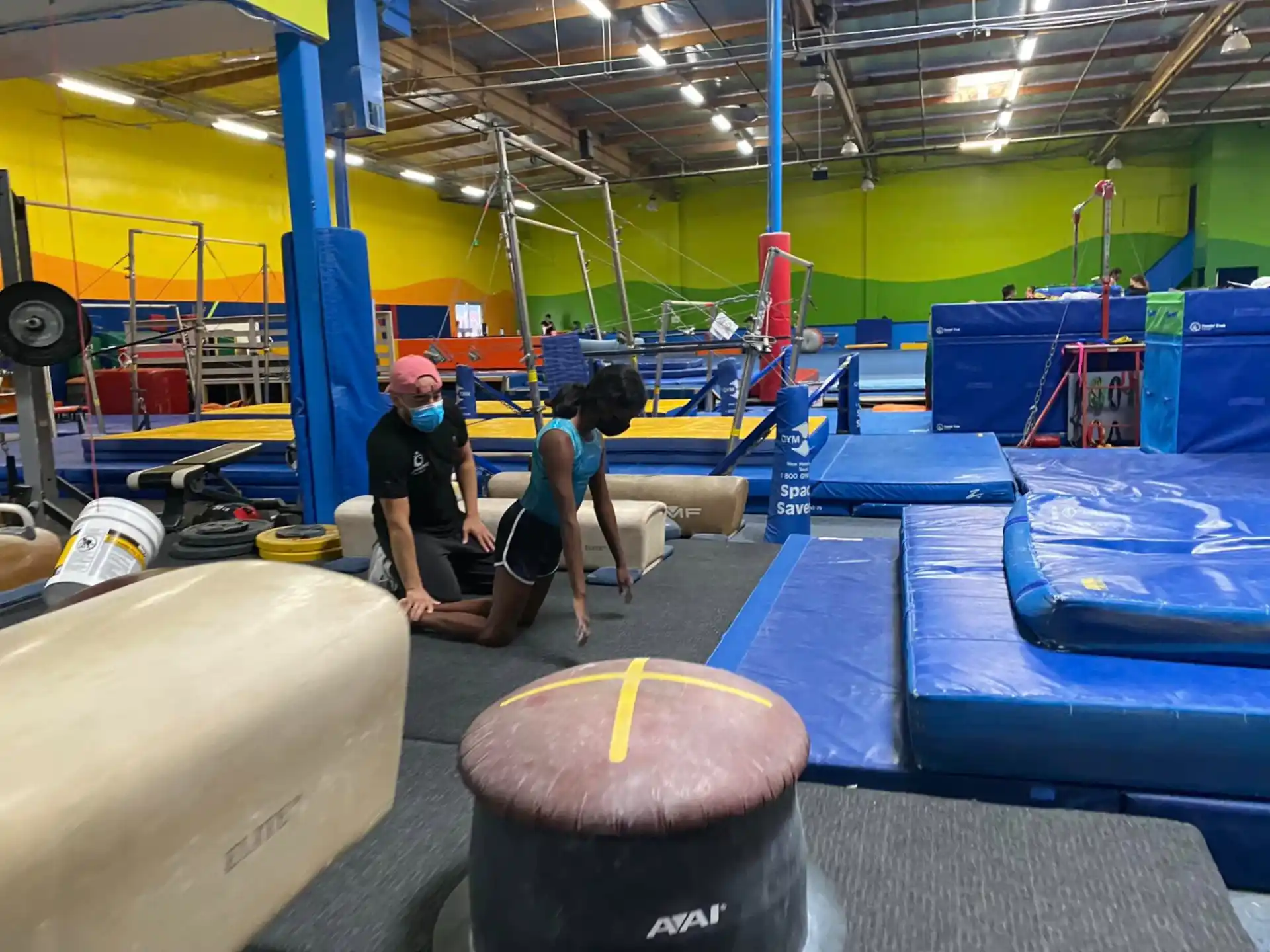 a group of people working out in a gym