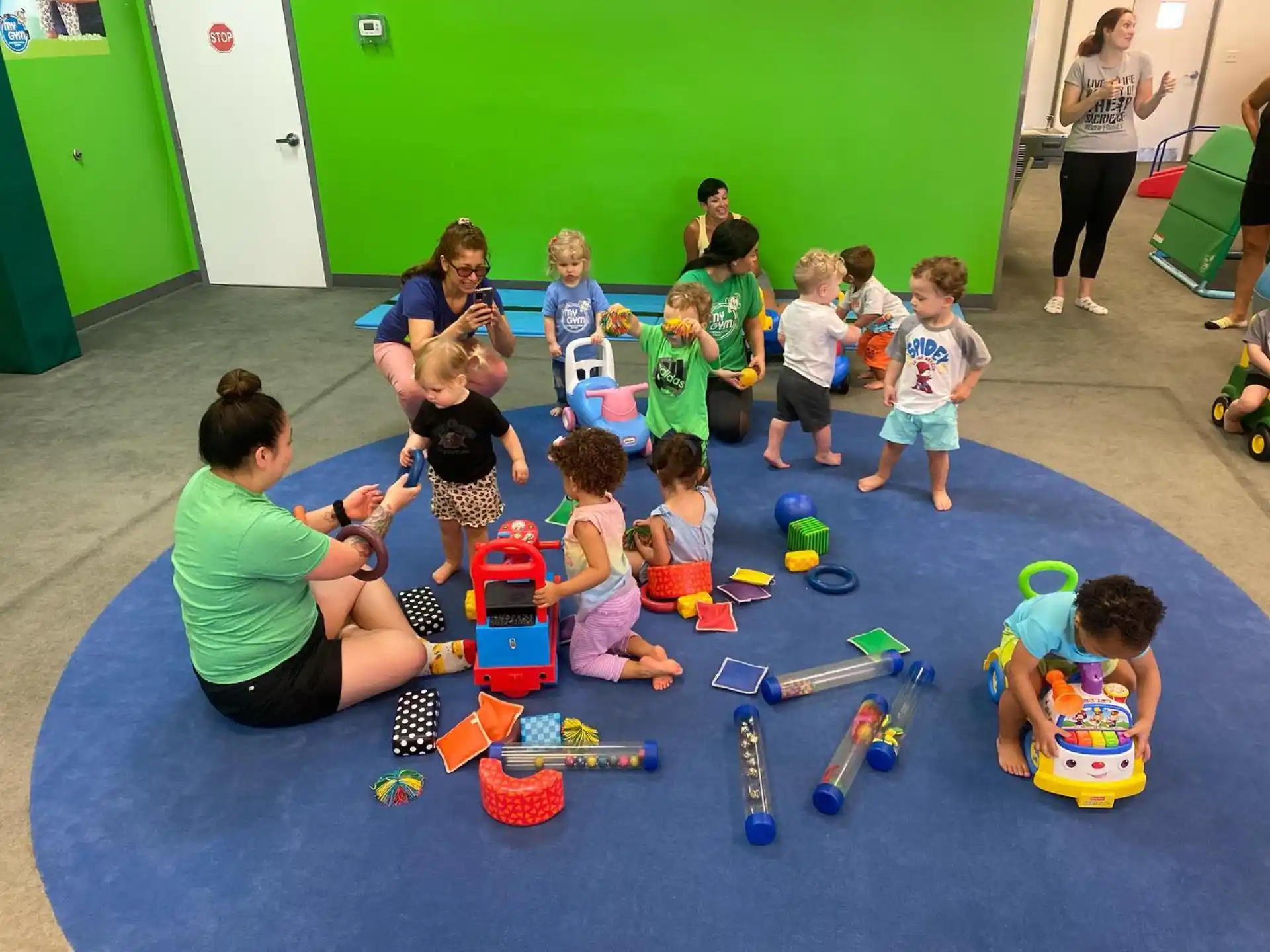 a group of children playing with toys