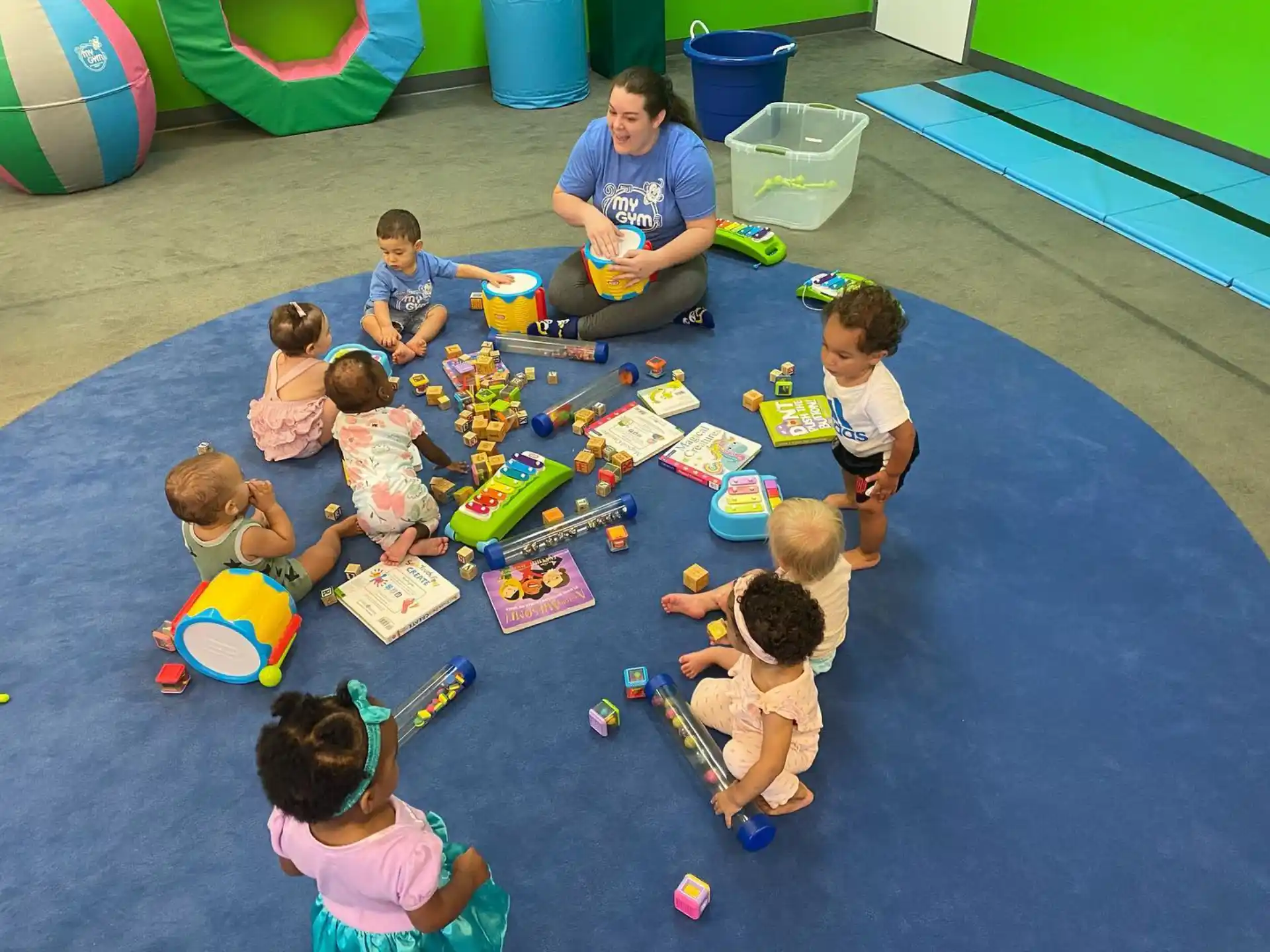 a group of children playing with toys