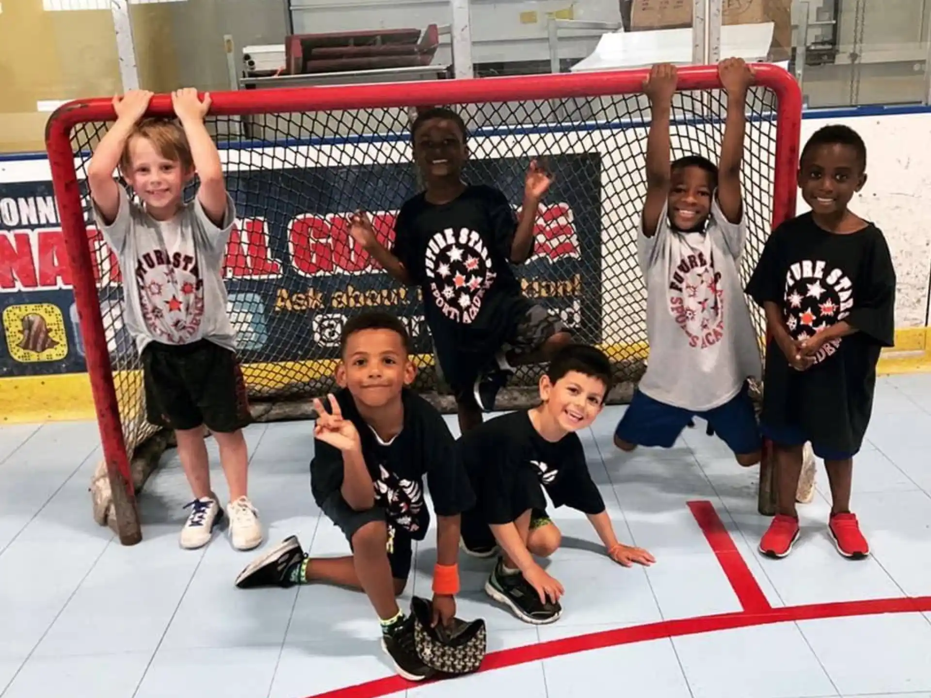 a group of kids posing for a photo