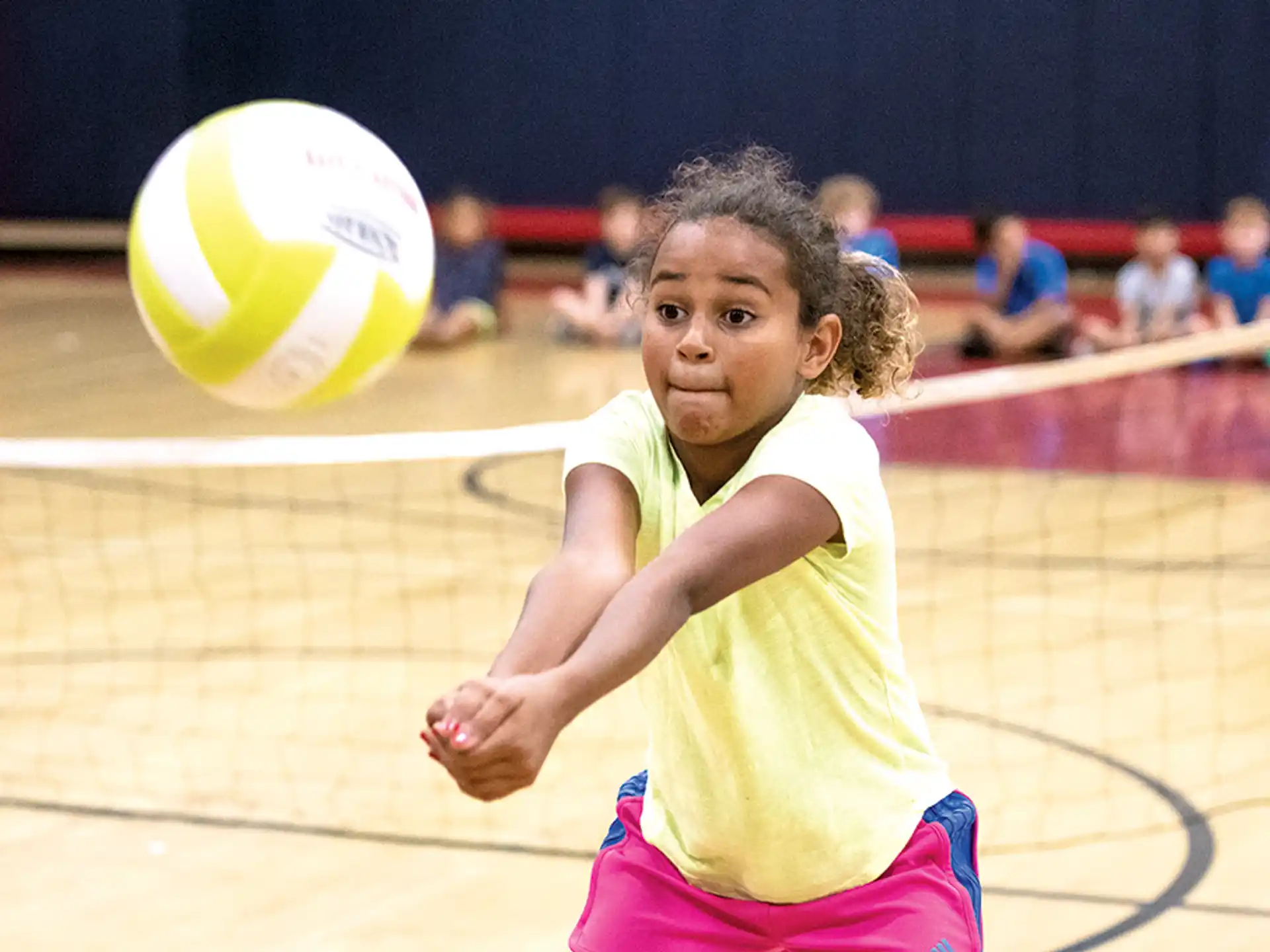 a girl playing volleyball