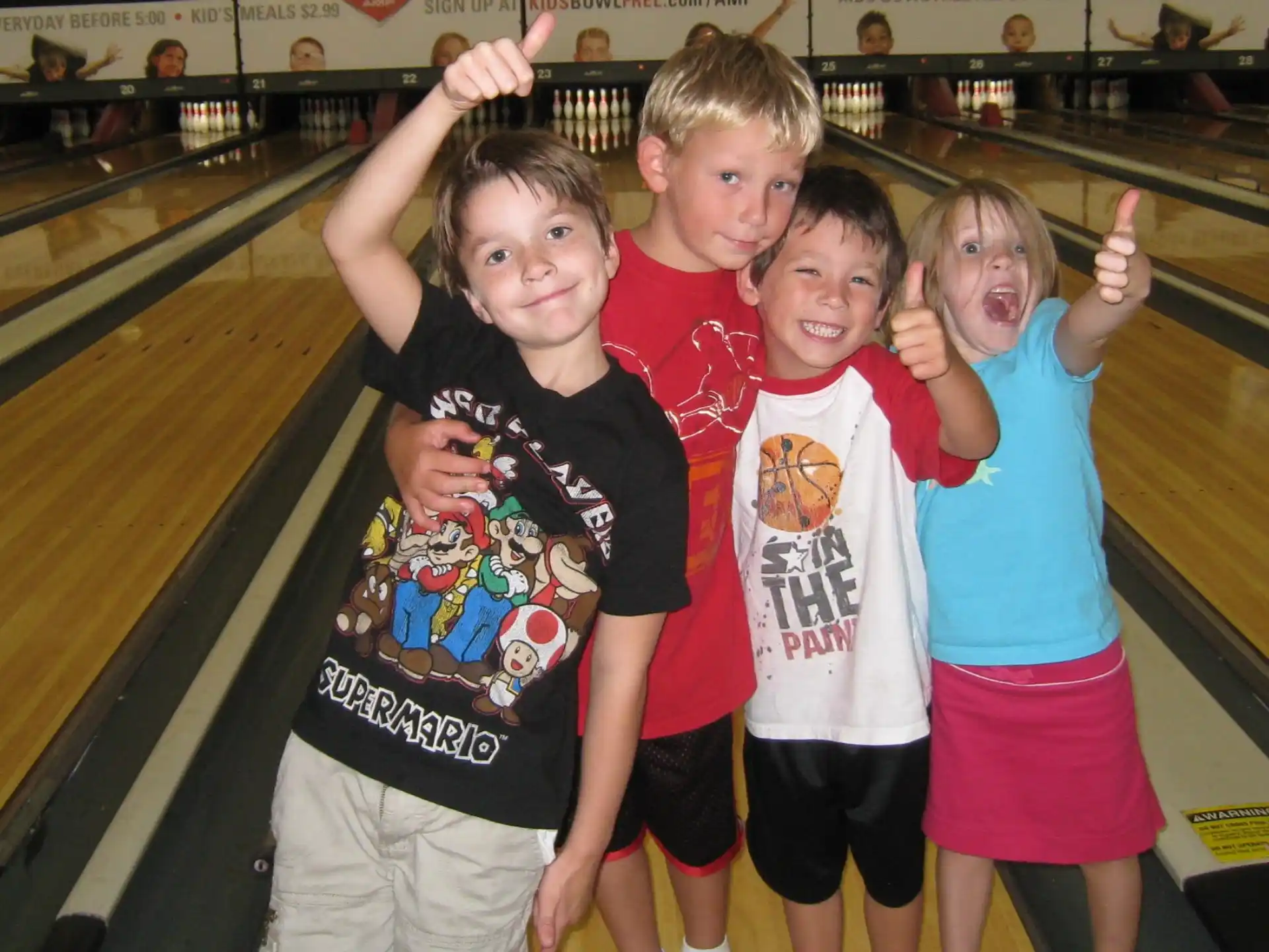 a group of children posing for a photo