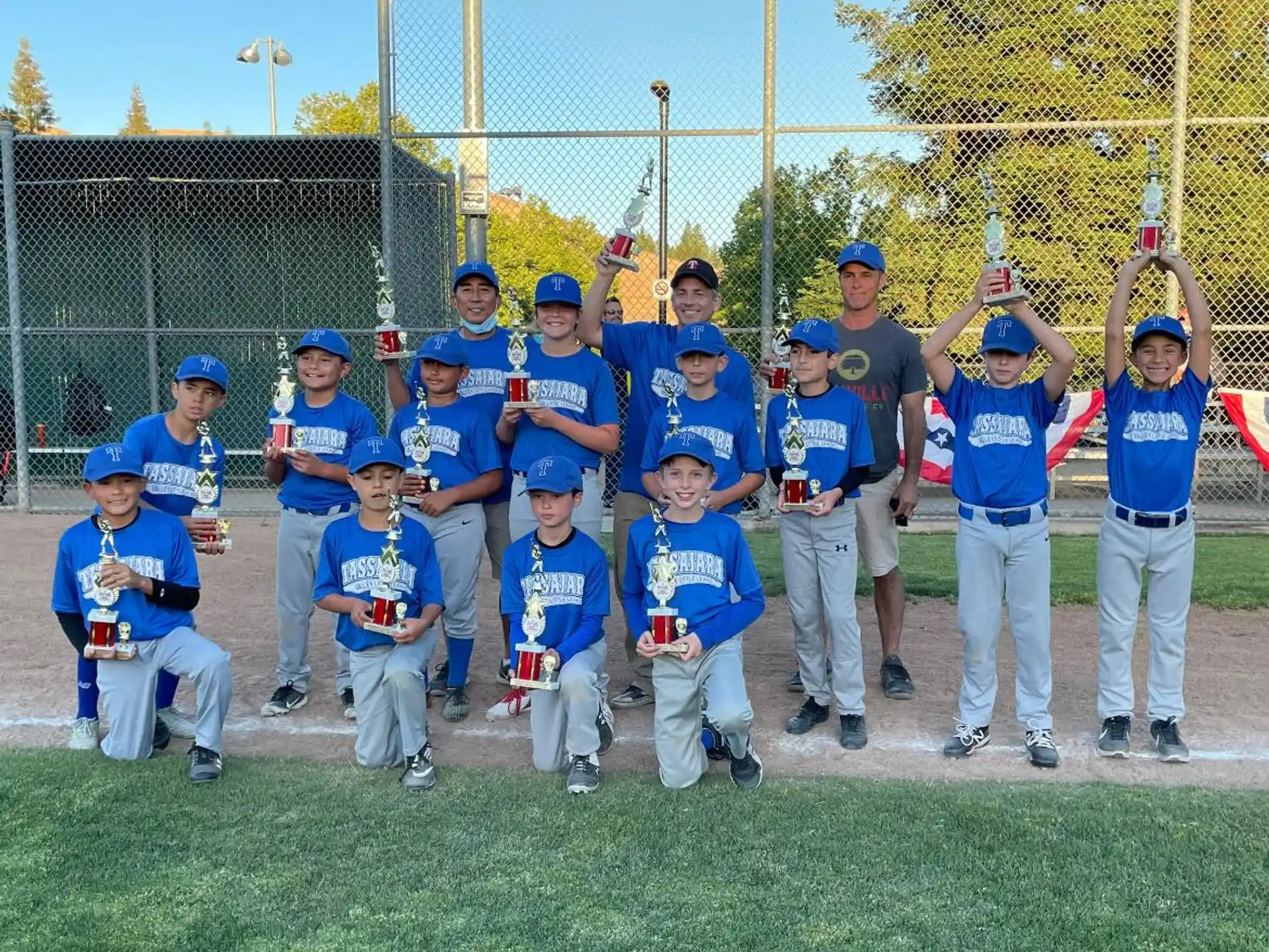 a group of baseball players posing for a photo