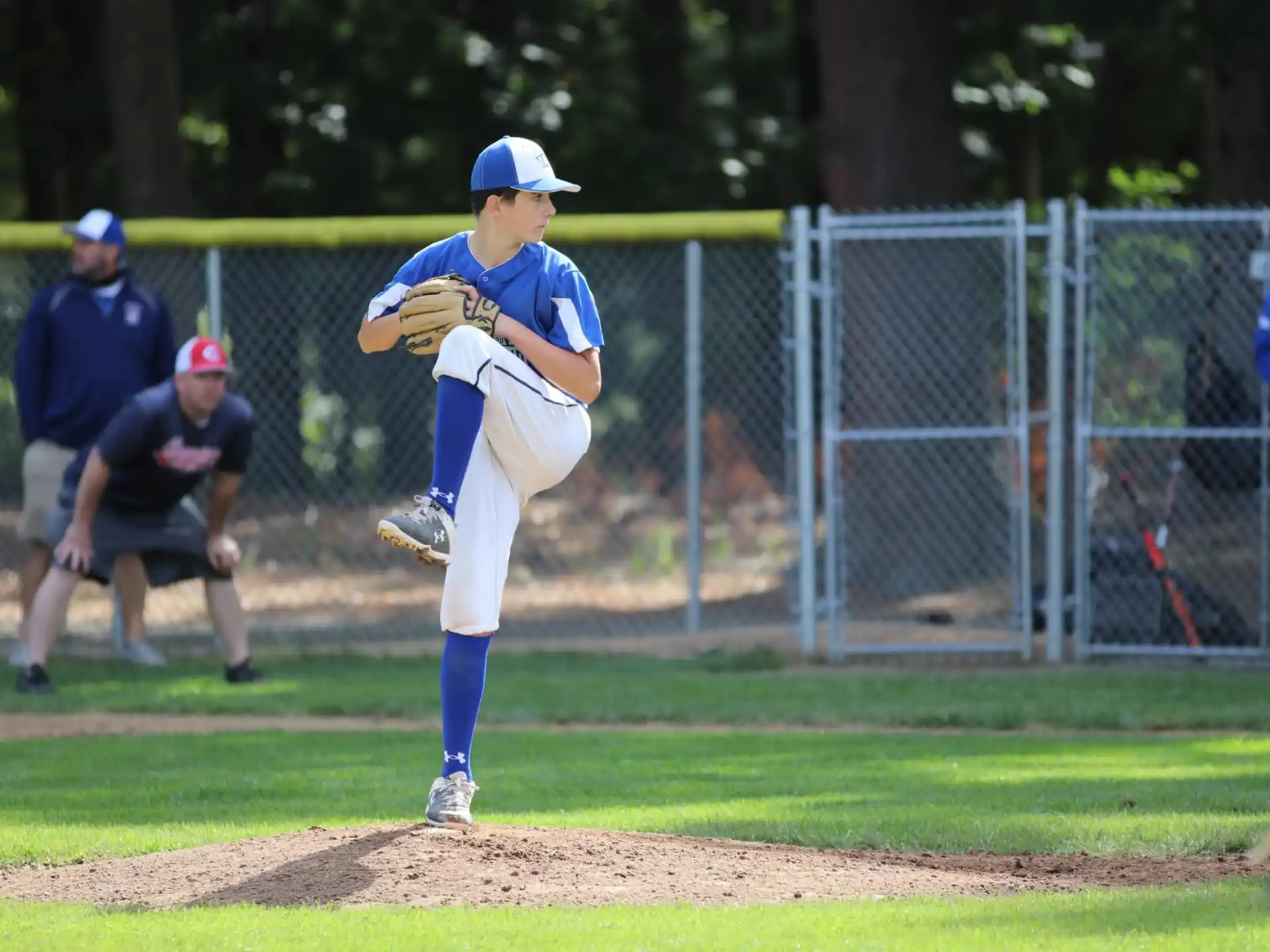 a baseball player throwing a ball
