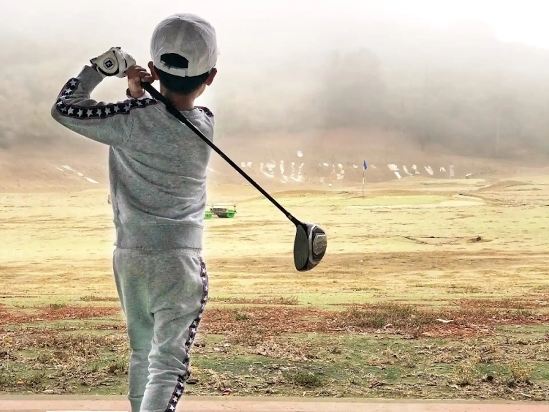 a man playing golf