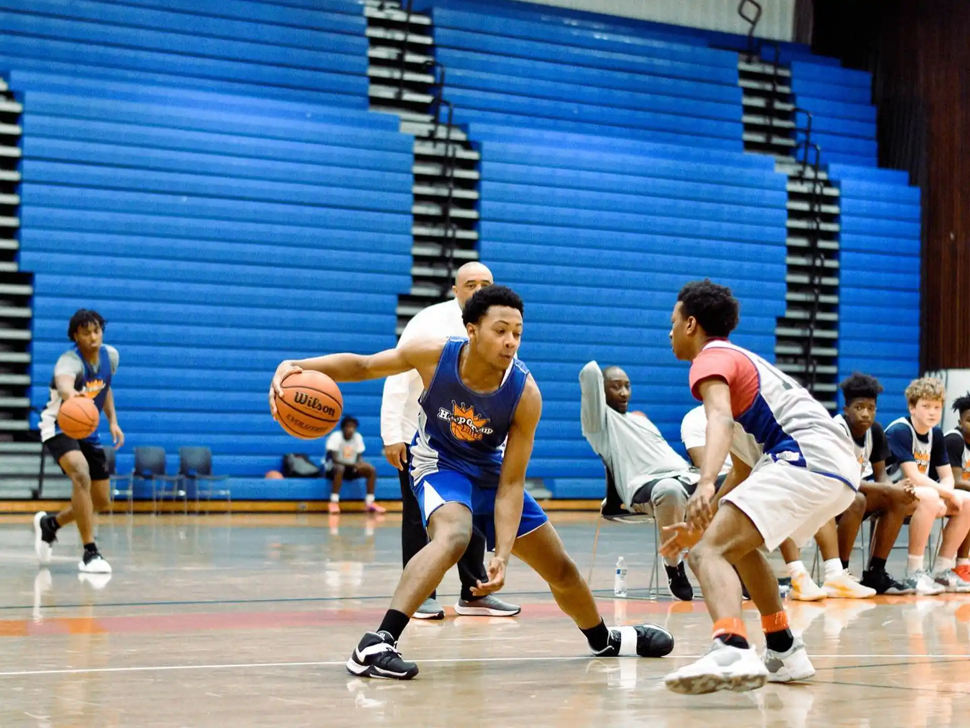 a group of people playing basketball