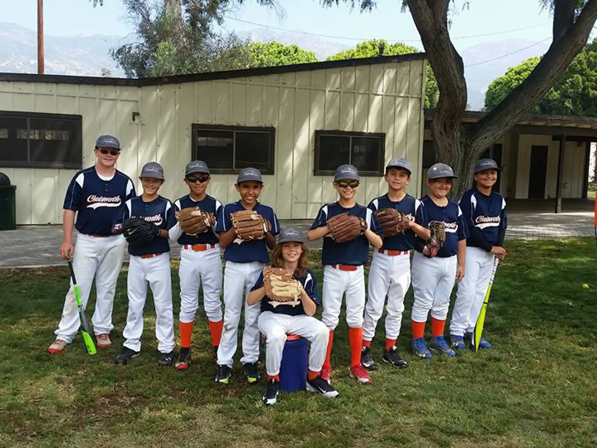 a group of baseball players posing for a photo
